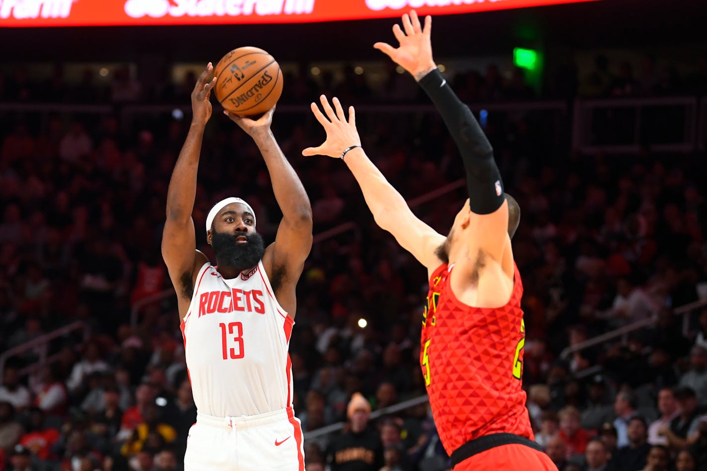 Houston Rockets star James Harden (13) is likely to put up a three-pointer from anywhere over midcourt.