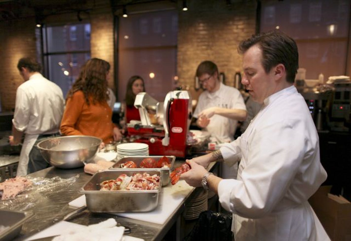 Chef/co-owner Isaac Becker preps lobster for the night.