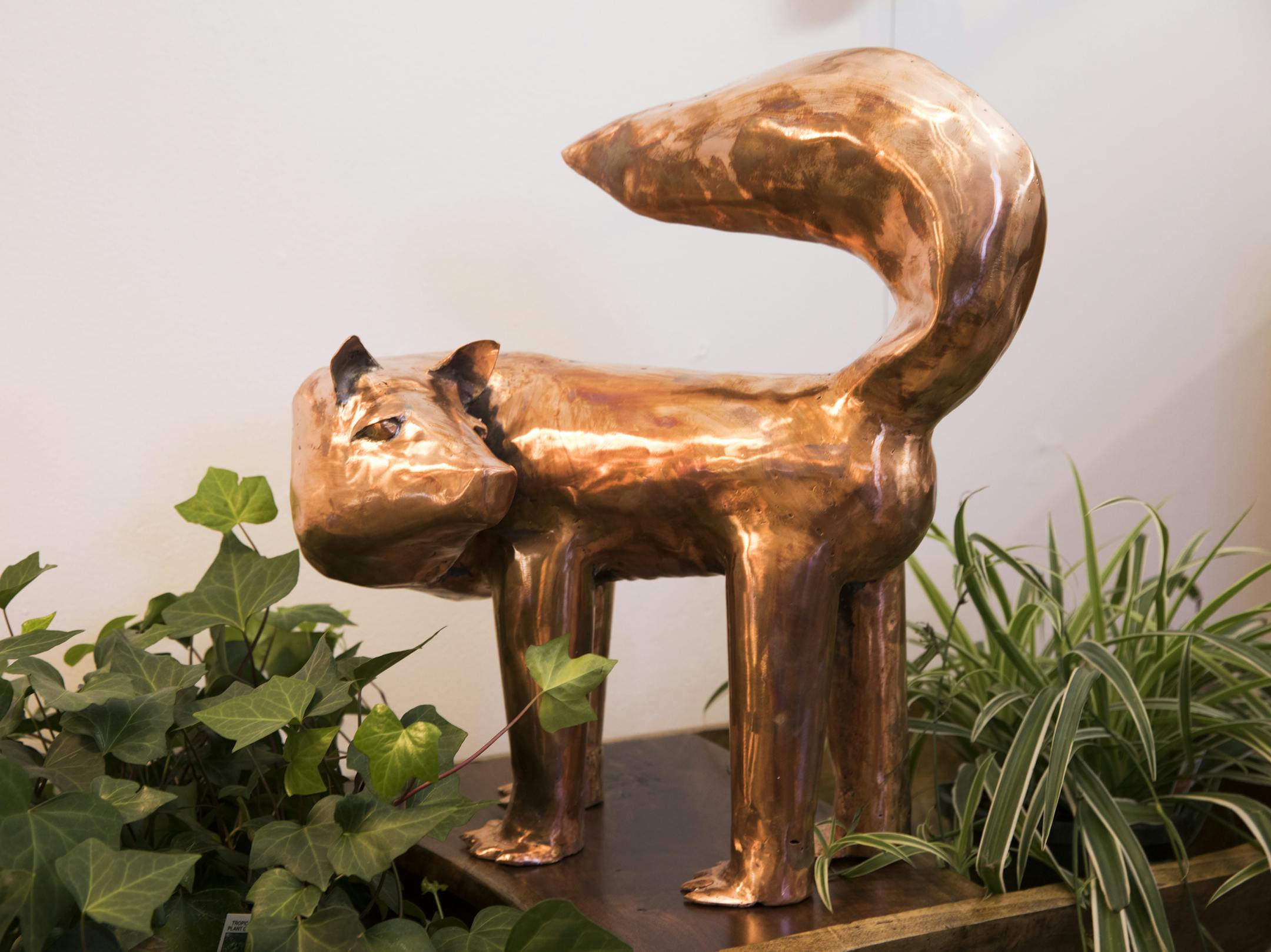 A copper statue by Turtle Clan Art of Wisconsin on display in the room vignette. ] LEILA NAVIDI &#xef; leila.navidi@startribune.com BACKGROUND INFORMATION: Designers Neal Kielar and John Mehus of MidModMen+friends in St. Paul with their room vignette on Monday, March 27, 2017. Room vignettes at the American Craft show, held in St. Paul in April, will showcase decor through the decades.