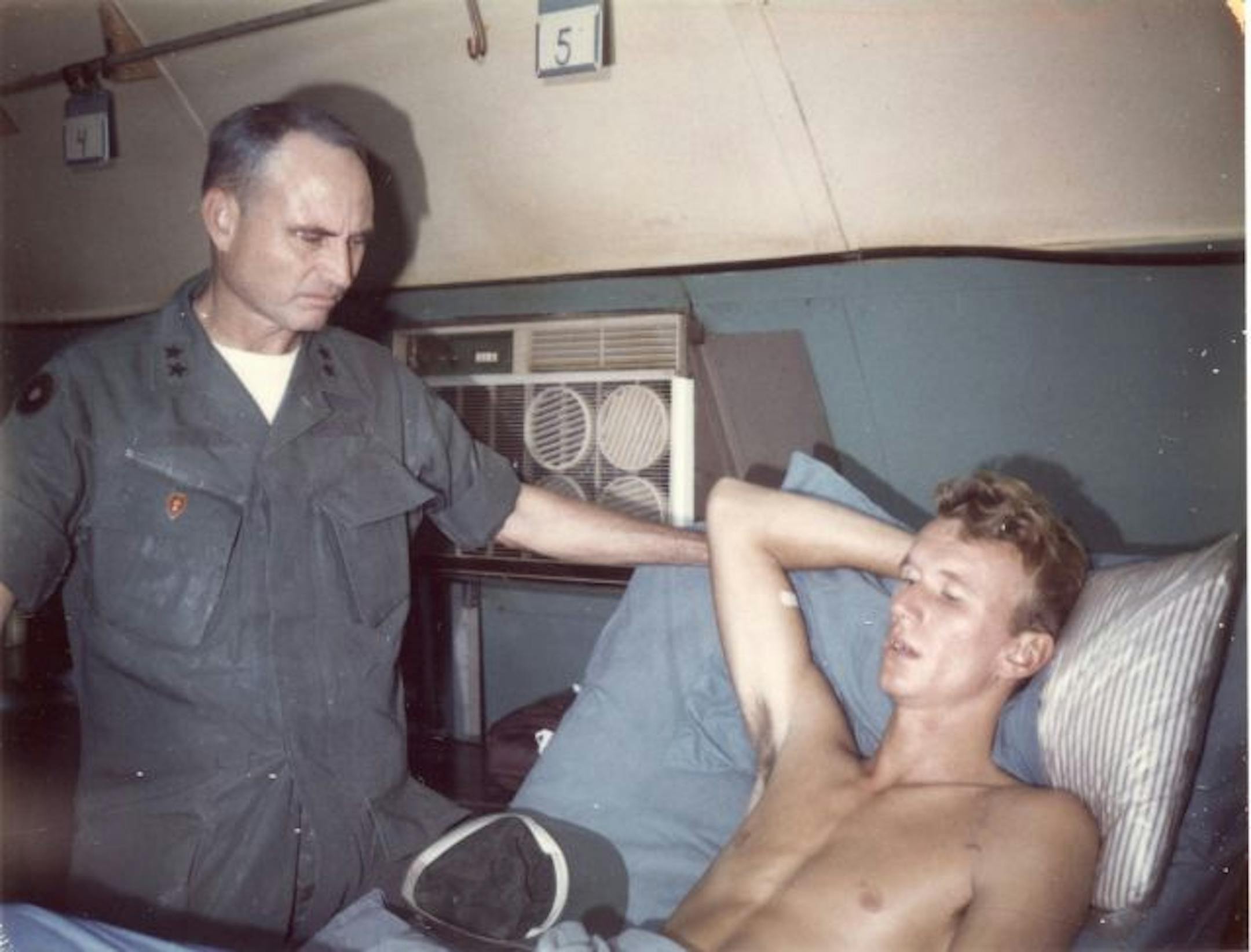 After Glenn Boche was shot three times in the leg, Gen. Harris Hollis awarded him a Purple Heart at Tan Son Nhut. "Every day, it becomes a little bit easier for me to talk about," Boche said of the war.