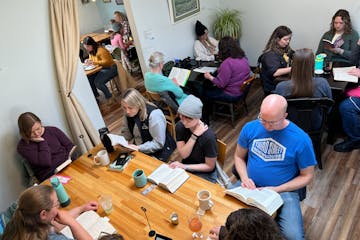 At the March meeting of the Silent Book Club's Minneapolis chapter, two dozen people gathered at Cream & Amber in Hopkins to quietly read different bo