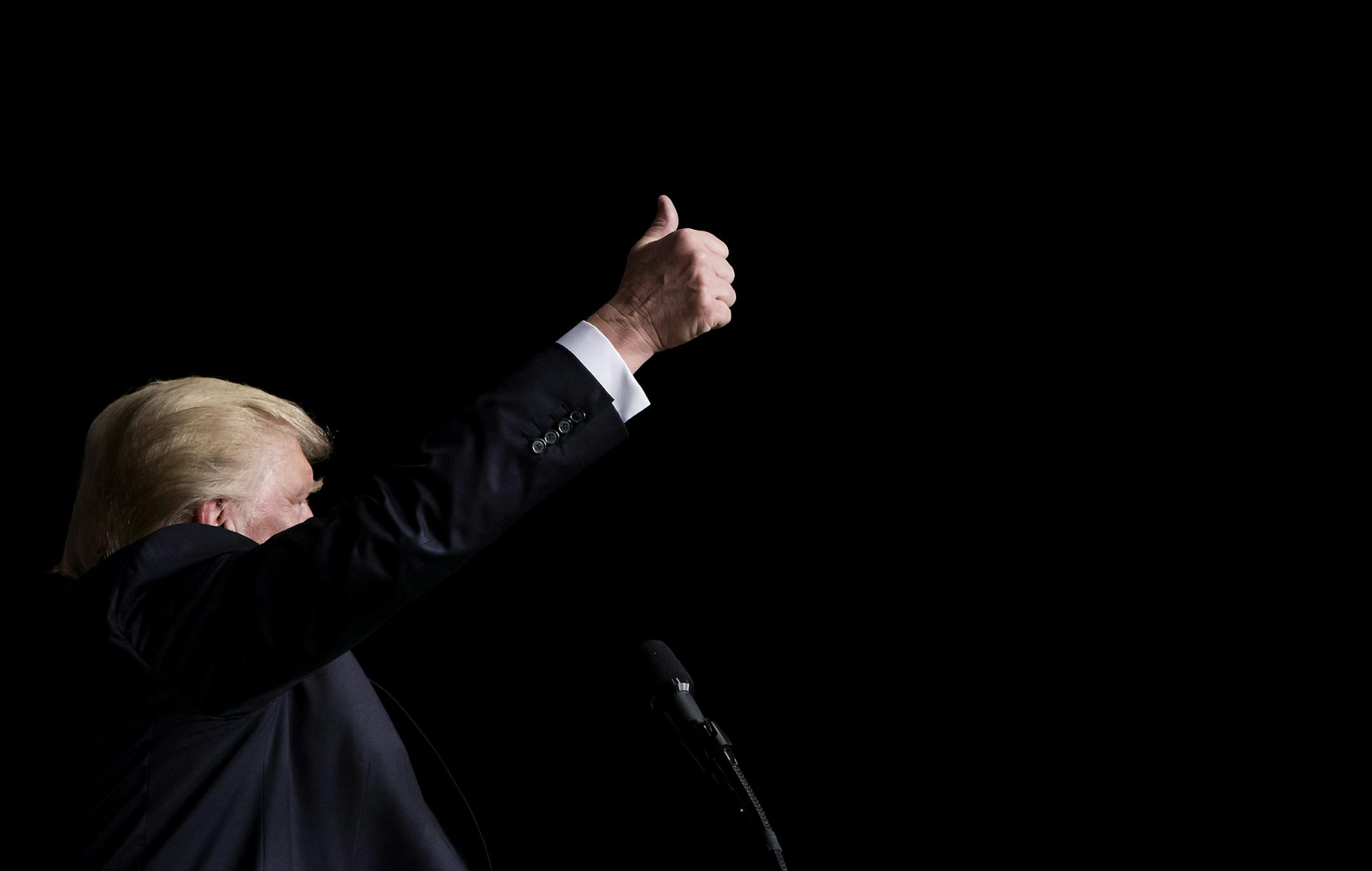 FILE — Donald Trump gives the crowd a thumbs up while campaigning in Eau Claire, Wis., April 2, 2016. Online-only polls tend to show a narrower gap between Trump and Hillary Clinton in a theoretical general election matchup than ones conducted by phone interview. There are a number of possibilities as to why. (Eric Thayer/The New York Times)
