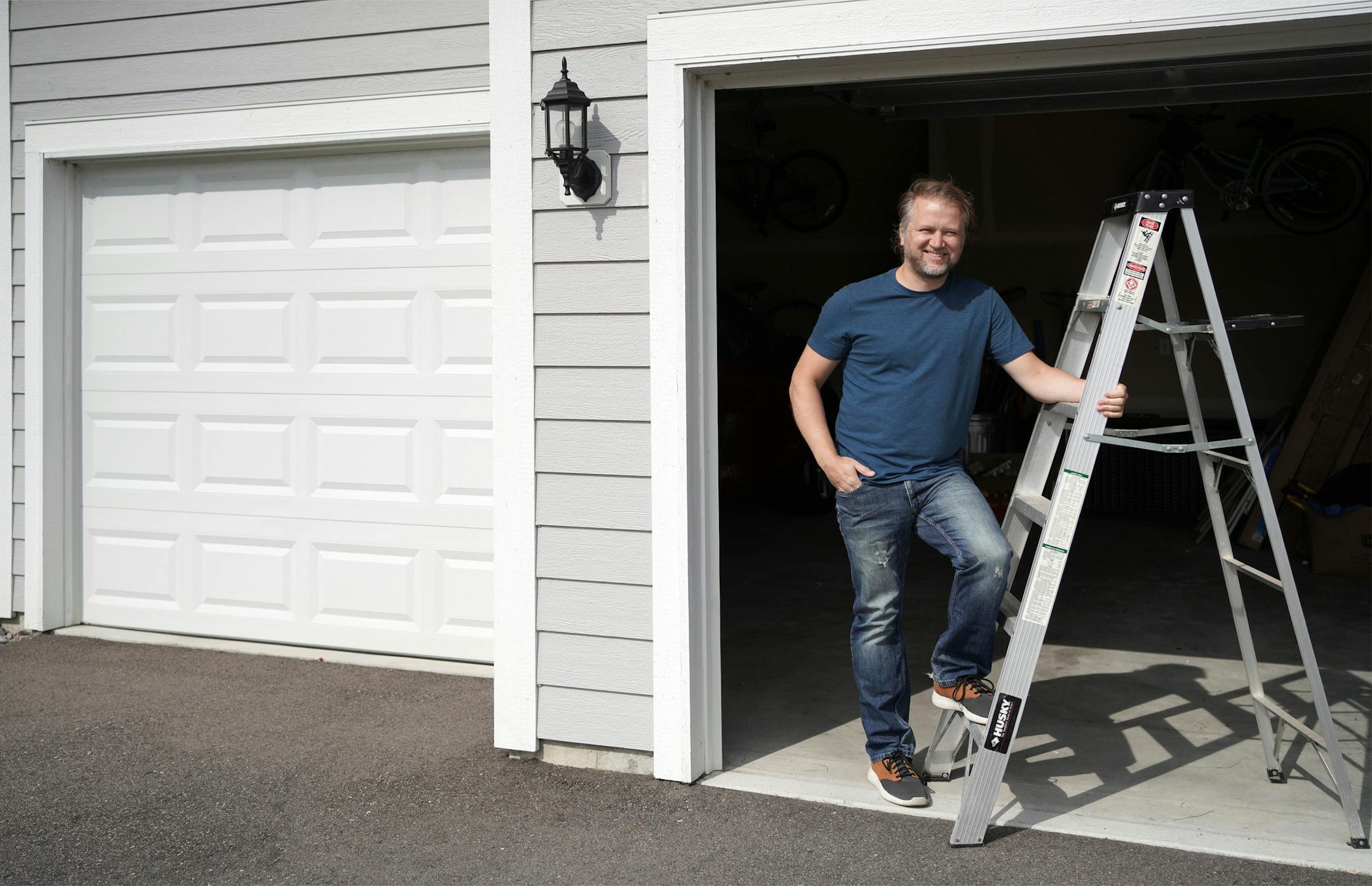 Don Rowan of Maple Grove put in a three-car garage, knowing he could fill the third stall. Unlike most homeowners, he's filled it with other people's cars.