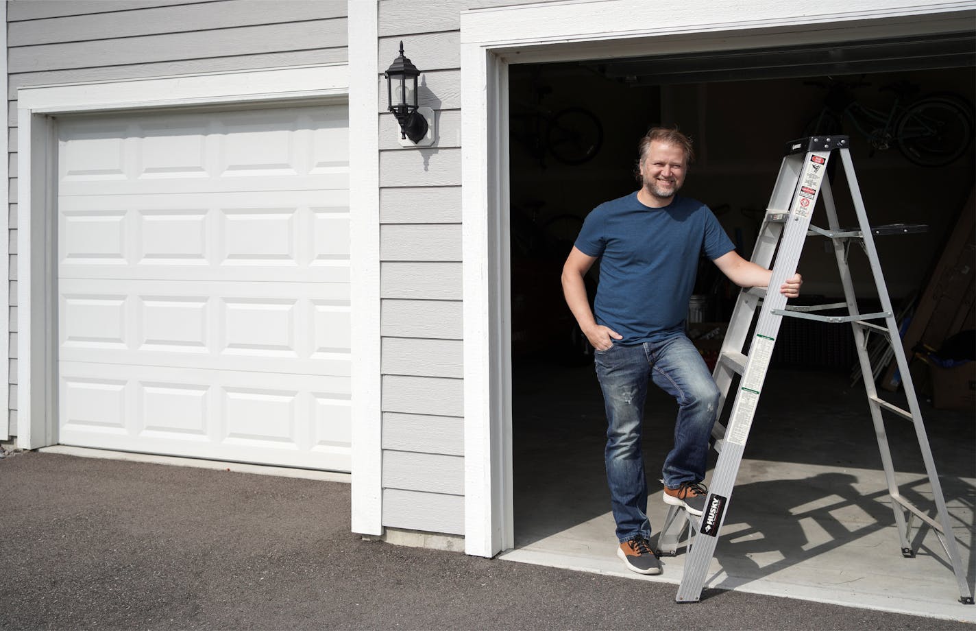 Don Rowan of Maple Grove put in a three-car garage, knowing he could fill the third stall. Unlike most homeowners, he's filled it with other people's cars.