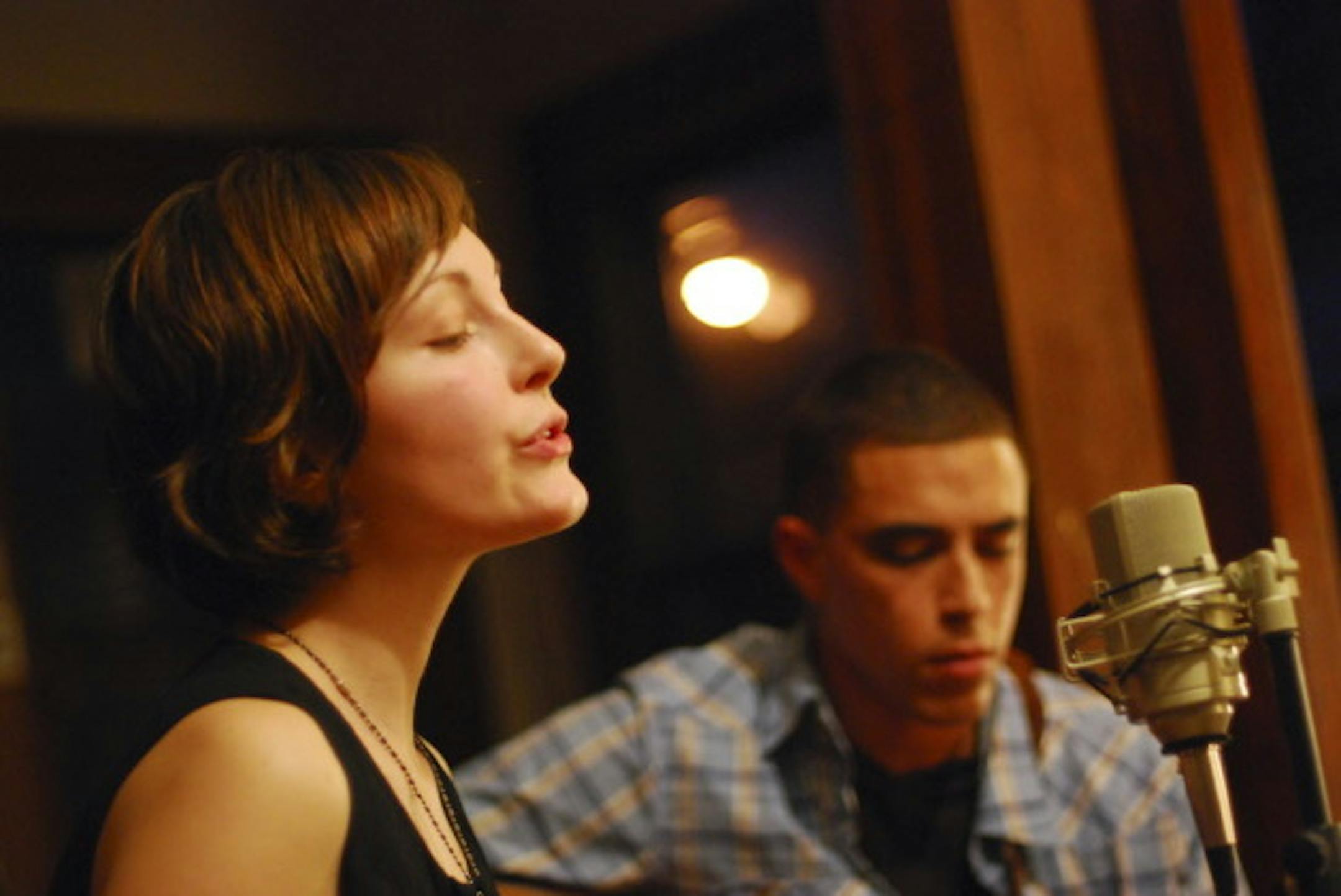 Channy and Alexei Moon Casselle at a 2010 house concert. / Photo by Leslie Plesser
