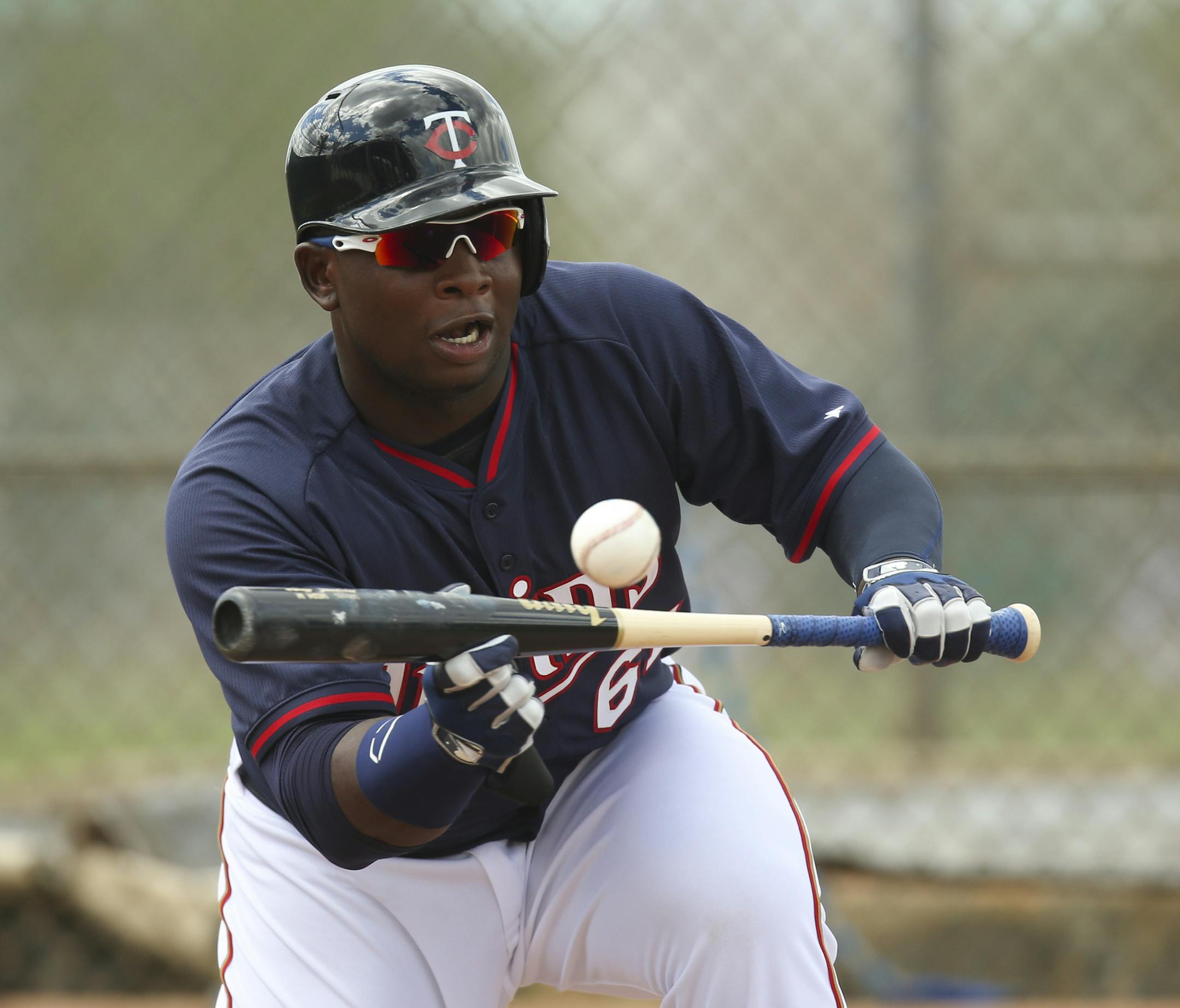 Twins third baseman Miguel Sano bunted during a clinic Former Twin Rod Carew was holding Tuesday morning at Hammond Stadium. ] JEFF WHEELER ï jeff.wheeler@startribune.com The Twins held another spring training workout Tuesday morning, March 3, 2015, at Hammond Stadium in Fort Myers, FL. ORG XMIT: MIN1503061713290908