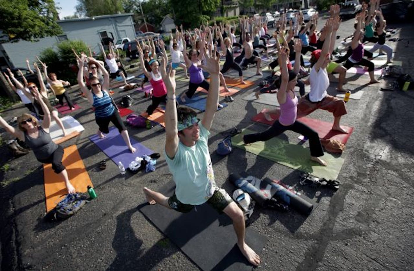 Front, Ben Wuest and half of the students at Gorrilla Yoga meet at 27th and Lyndale.