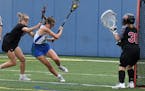 Blake attacker Erin Lee works her way to the goal in a 15-10 victory over Eden Prairie on 5/22/2021