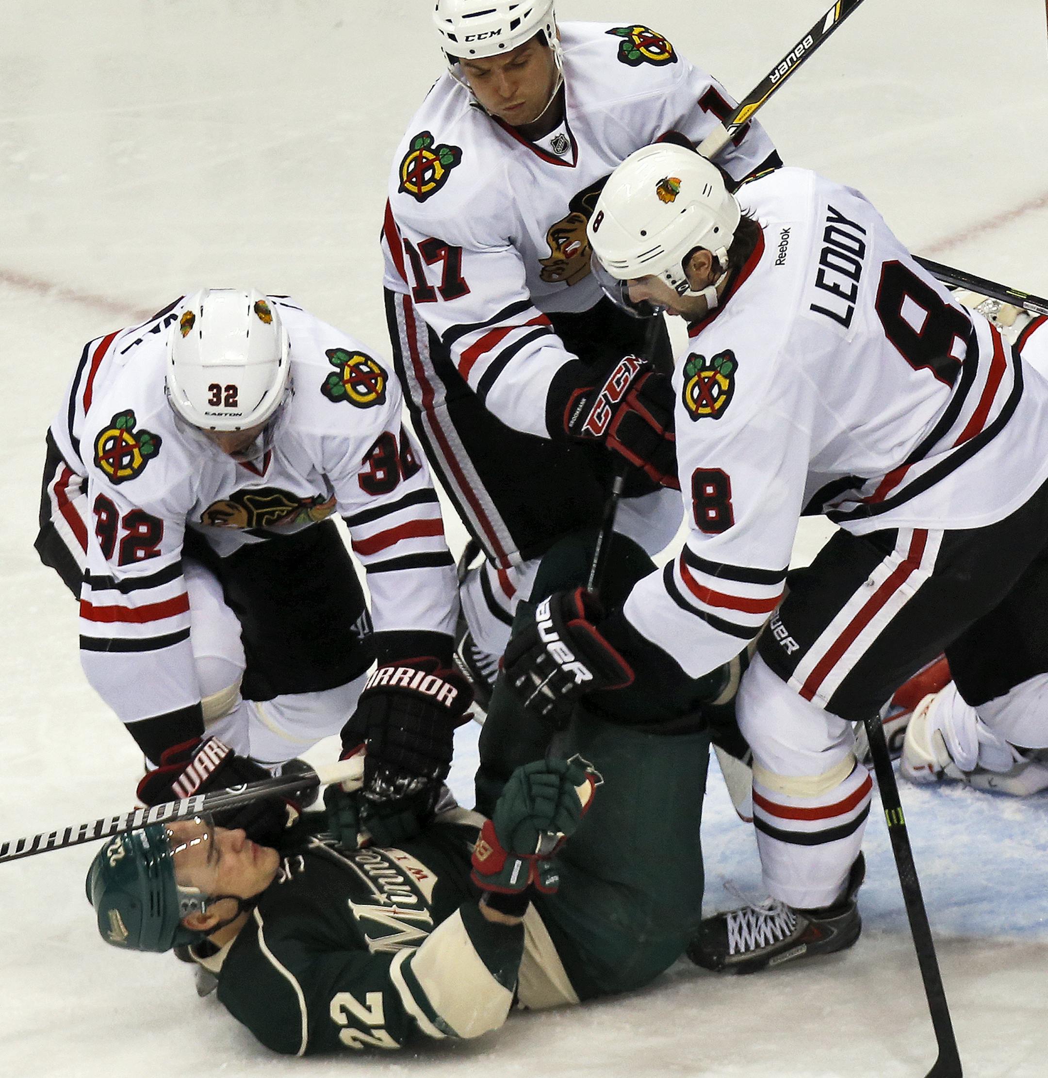 Minnesota Wild vs. Chicago Blackhawks. Minnesota won 4-3. In a physical 3rd period Wild Nino Niederreiter (22) was knocked to the ice. (MARLIN LEVISON/STARTRIBUNE(mlevison@startribune.com)