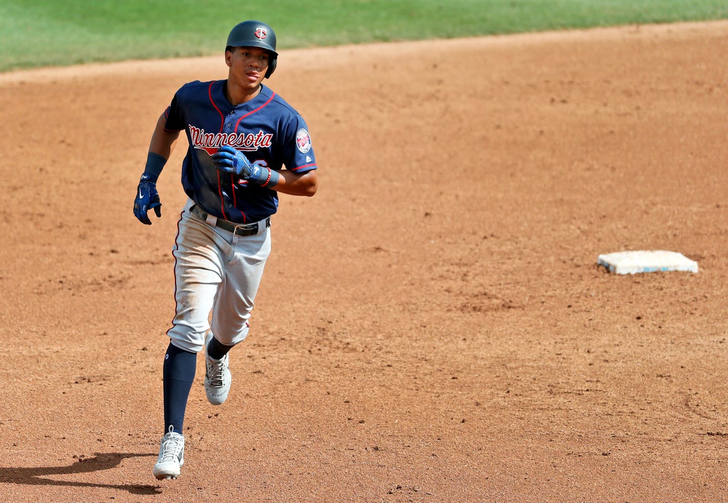 Minnesota Twins' Ehire Adrianza rounds the bases after hitting a two-run home run during the fifth inning of an exhibition spring training baseball game against the St. Louis Cardinals, Thursday, March 1, 2018, in Jupiter, Fla. (AP Photo/Jeff Roberson)