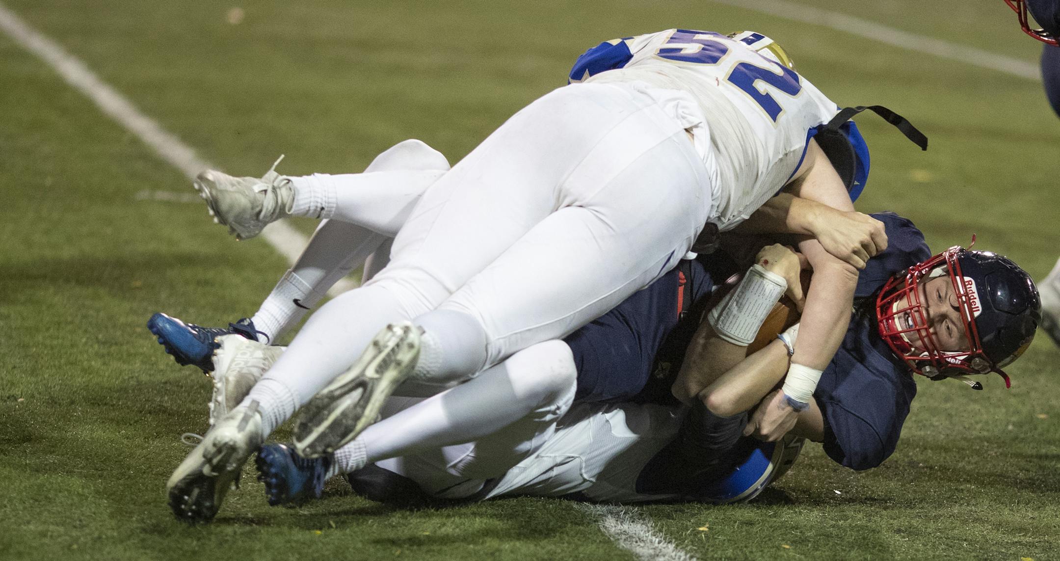 Holy Angels linebacker Toby Vetsch sacked Orono quarter back Teddy Deters in the fourth quarter at Orono H.S.] Jerry Holt • Jerry.holt@startribune.com Orono H.S. hosted Holy Angels in class 4A, section 5 quarterfinal high school football at Orono High School Tuesday Oct. 22, 2019. Long Lake, MN. Jerry Holt