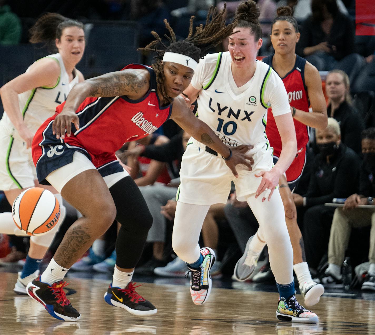 Washington Mystics forward Myisha Hines-Allen (2) battles for the ball against Minnesota Lynx forward Jessica Shepard (10) in Minneapolis, Minn., on Sunday, May 8, 2022. The Washington Mystics take on the Minnesota Lynx at Target Center. ] RICHARD TSONG-TAATARII • richard.tsong-taatarii@startribune.com