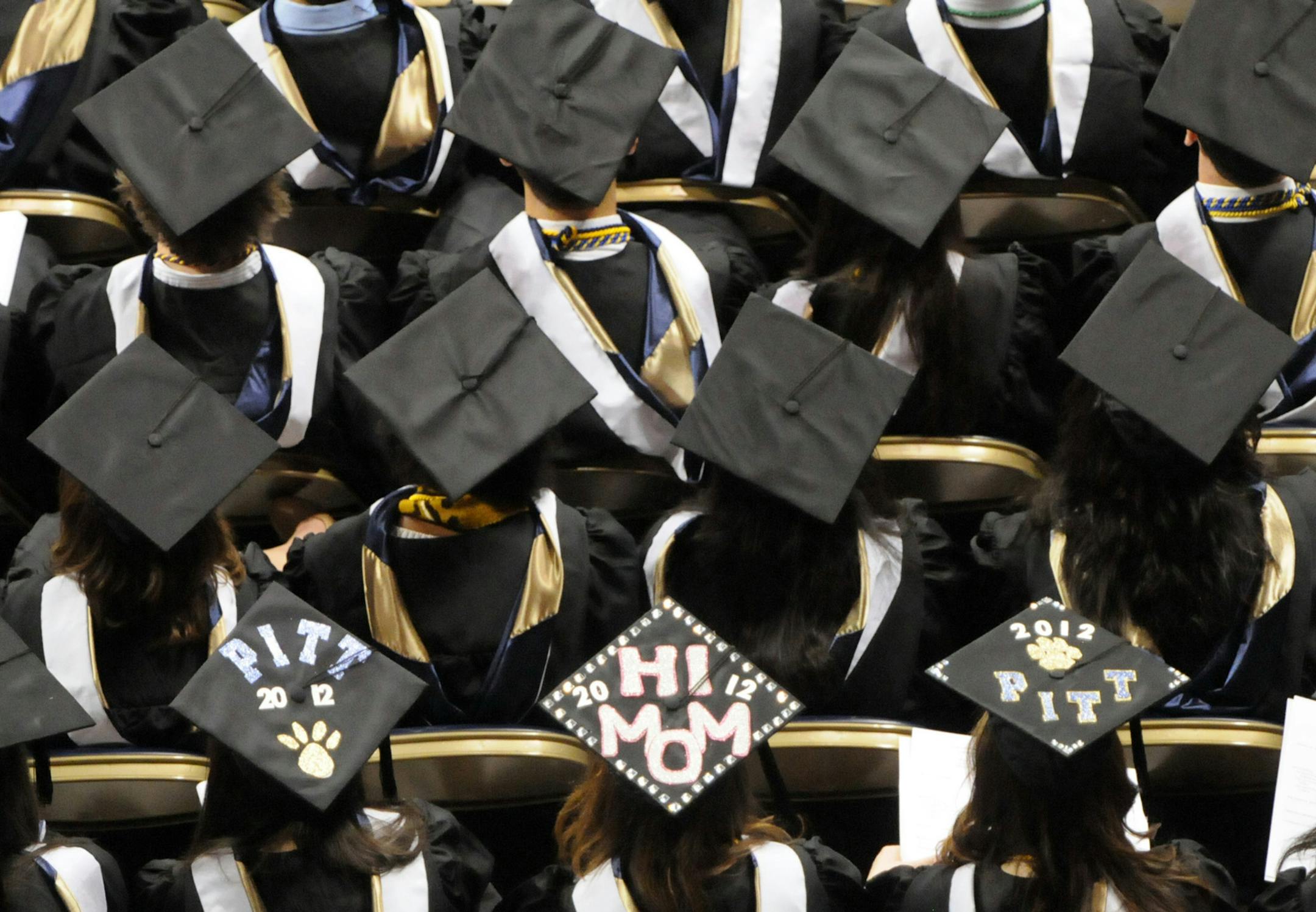 According to a new survey, nearly half of parents who haven't paid off their own student loans have saved at least $5,000 toward college costs for each of their children. (Bob Donaldson/Pittsburgh Post-Gazette/TNS) ORG XMIT: 1172691