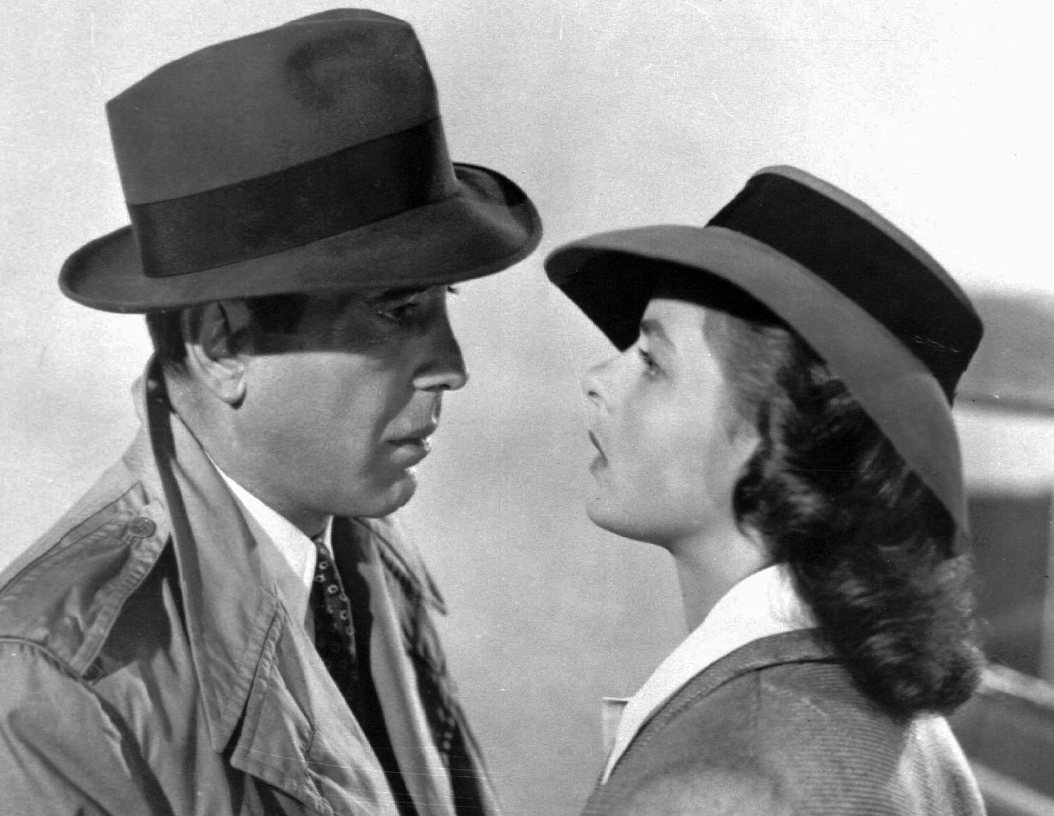 FILE-This photo provided by Warner Bros., shows actors Ingrid Bergman and Humphrey Bogart in a scene from the film "Casablanca." The piano used for the song "As Times Goes By" in the classic film is getting another turn at fame. The instrument is going up for sale at Sotheby's in New York on Dec. 14, 2012, and the auction house estimates it'll fetch up to $1.2 million. It's being offered by a Japanese collector on the film's 70th anniversary. Bogart played Rick Blaine in the Oscar-winning World