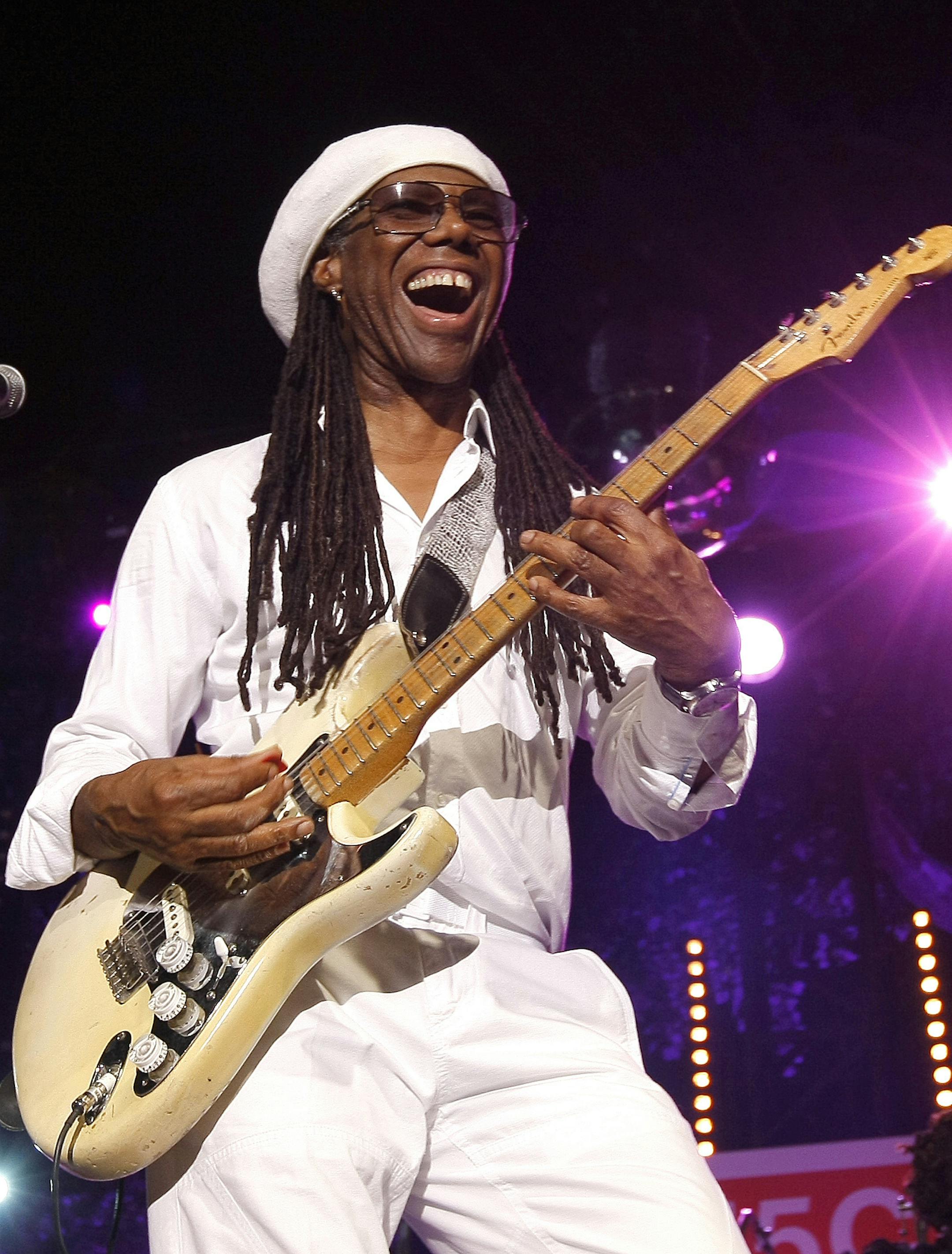 Guitarist Nile Rodgers of Chic performs at the Jazz Festival of 5 Continents, in Marseille, southern France, Saturday, July 20, 2013. (AP Photo/Claude Paris)