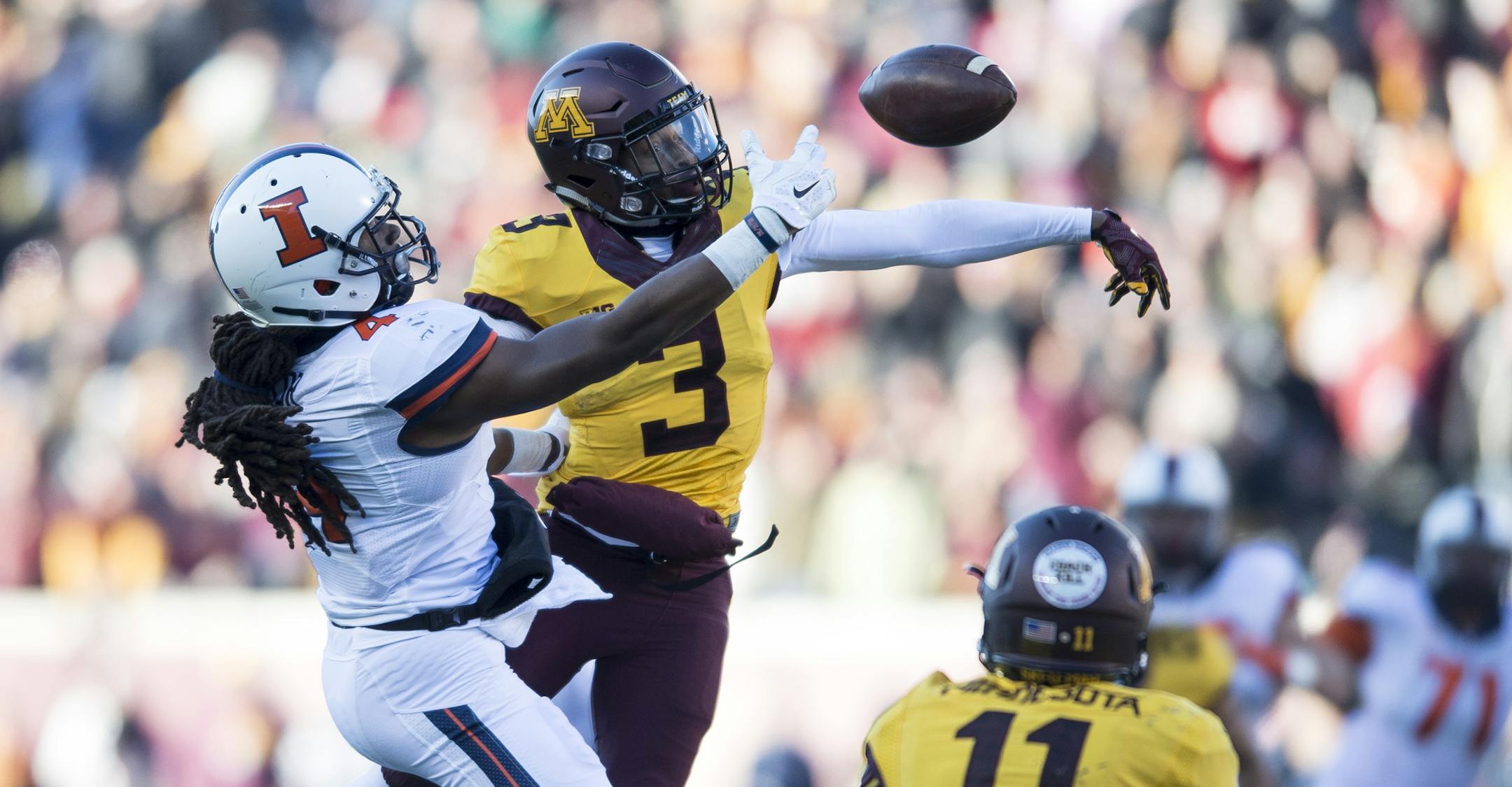 Minnesota Golden Gophers defensive back KiAnte Hardin (3) batted away a pass intended for Illinois Fighting Illini wide receiver Dionte Taylor (4), leading to an interception by Gophers defensive back Antonio Johnson (11) in the fourth quarter. ] (AARON LAVINSKY/STAR TRIBUNE) aaron.lavinsky@startribune.com The Minnesota Golden Gophers played the Fighting Illini of Illinois on Saturday, Nov. 21, 2015 at TCF Bank Stadium in Minneapolis, Minn.