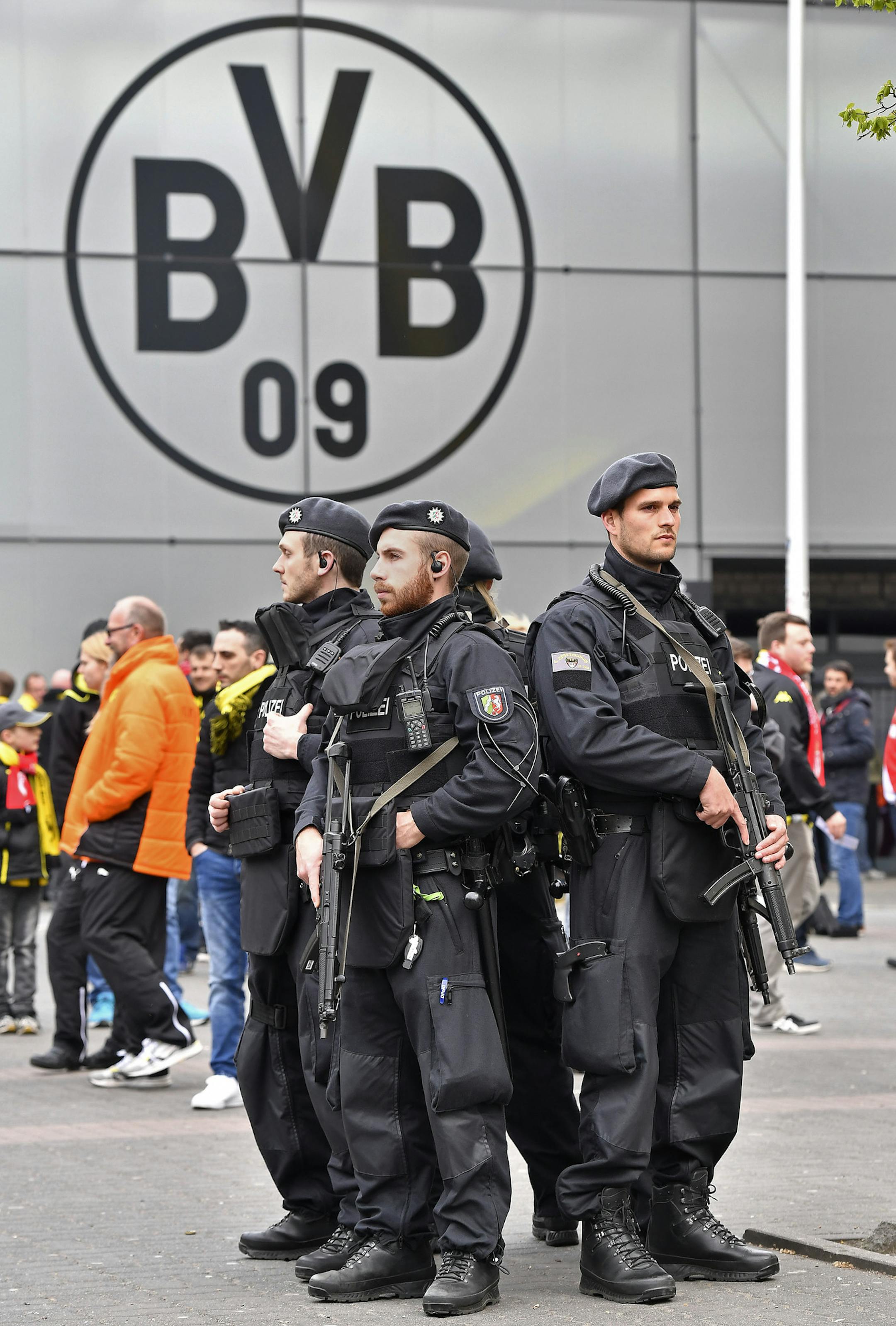 Police secure the area in front of the stadium, prior to the Champions League first leg quarterfinal soccer match between Borussia Dortmund and AS Monaco in Dortmund, Germany, Wednesday, April 12, 2017. (AP Photo/Martin Meissner)