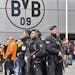 Police secure the area in front of the stadium, prior to the Champions League first leg quarterfinal soccer match between Borussia Dortmund and AS Mon