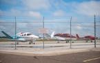 Small airplanes sat behind Cirrus Aircraft in Duluth on Monday June 29, 2020. 