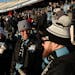 Minnesota United fans stood bundled up in the stands prior to the start of the first half.