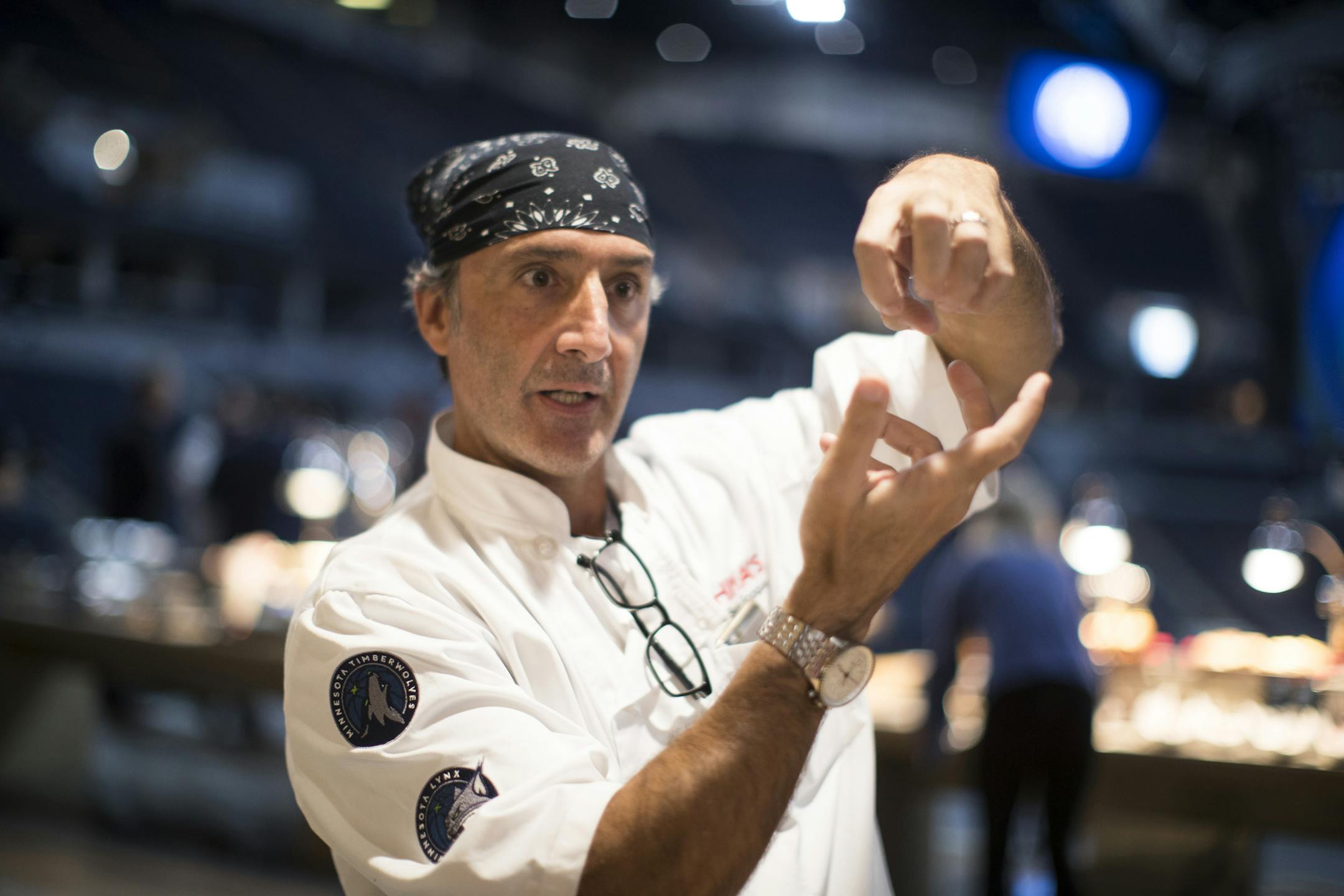 Chef David Fhima described how he makes his drumsticks "lollypop" style during an unveiling of the new food options at the renovated Target Center in Minneapolis on Tuesday, Oct. 10, 2017.