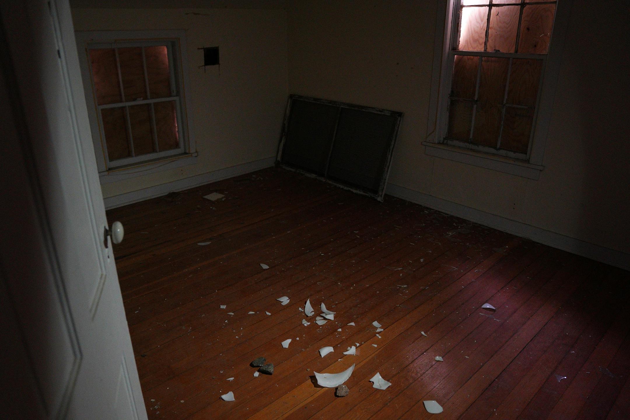 Broken plates laid on the floor of a bedroom in the upstairs of the 1902 Section Foreman House, a possible candidate for the National Register of Historic Places where the railroad foreman used to live, Thursday in Wayzata.