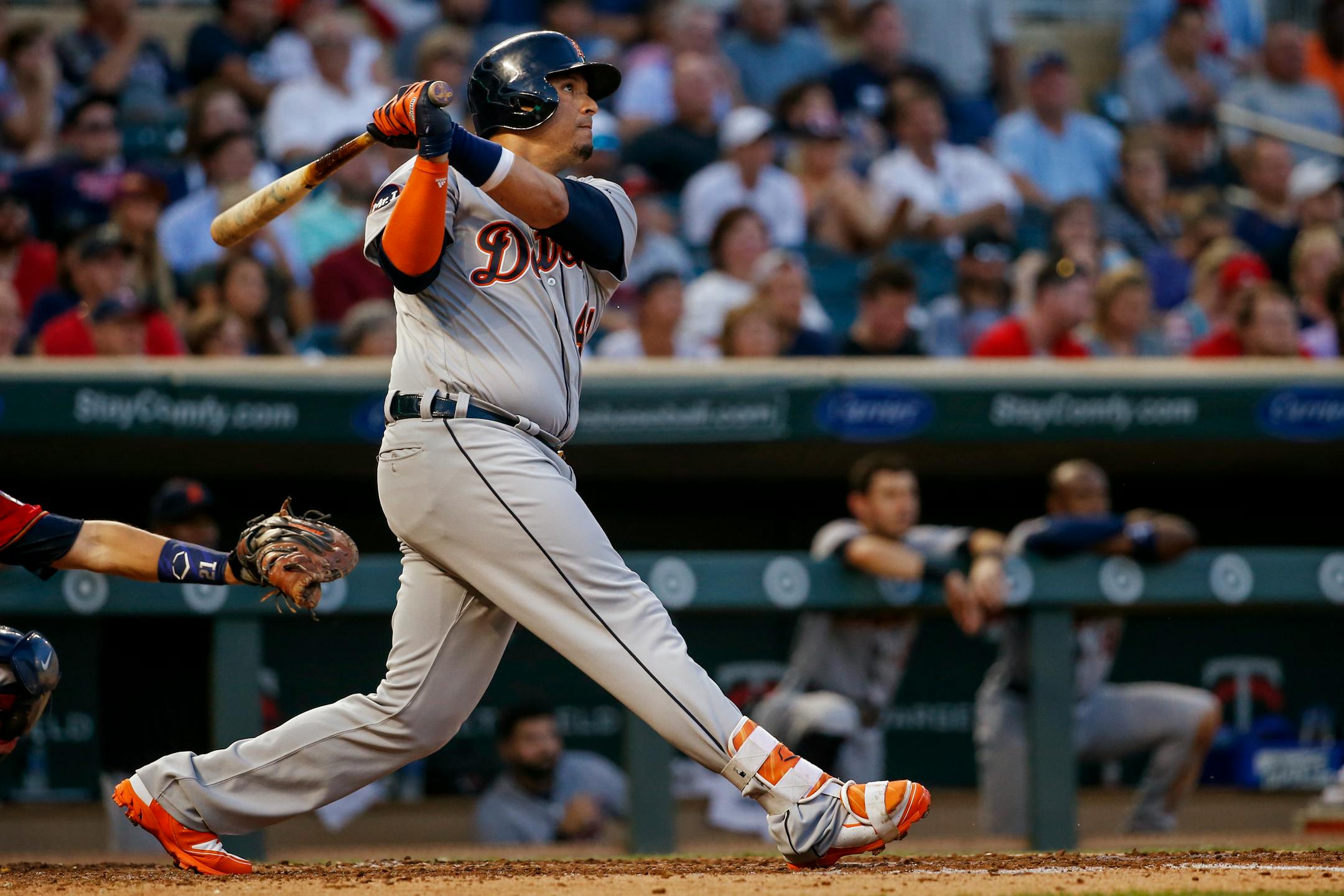 Detroit Tigers' Victor Martinez watches his two-run home run leave the park against the Minnesota Twins in the fourth inning of a baseball game Friday, July 21, 2017, in Minneapolis. (AP Photo/Bruce Kluckhohn)