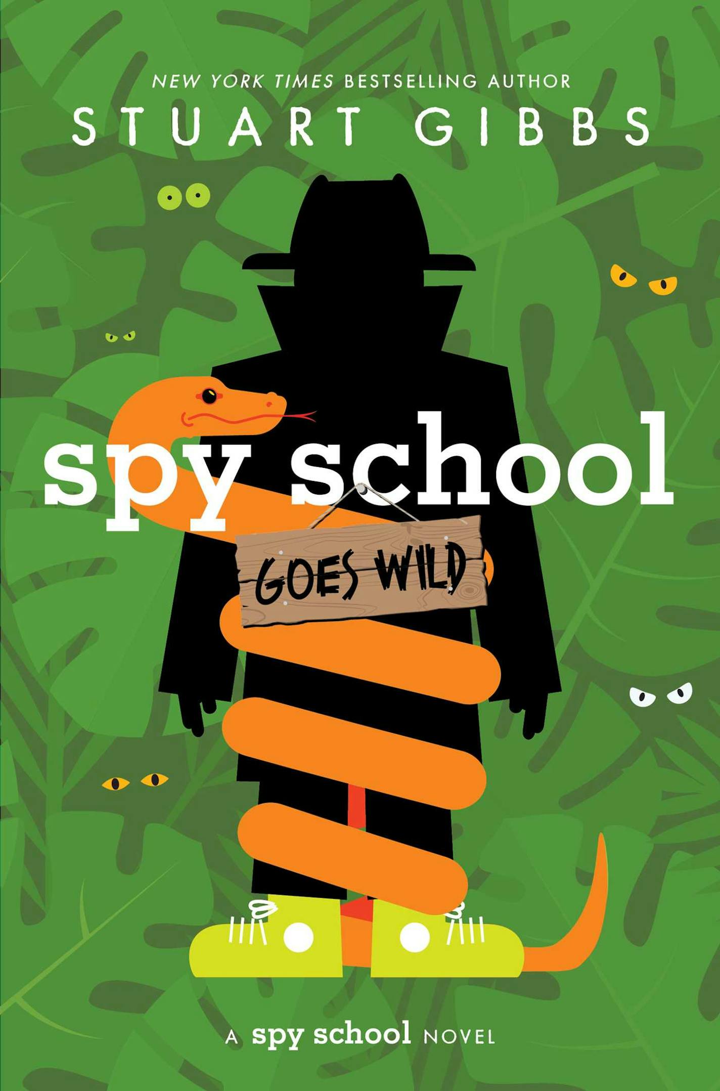 on a green background, cover of Spy School Goes Wild features the silhouette of a spy, wrapped in a snake