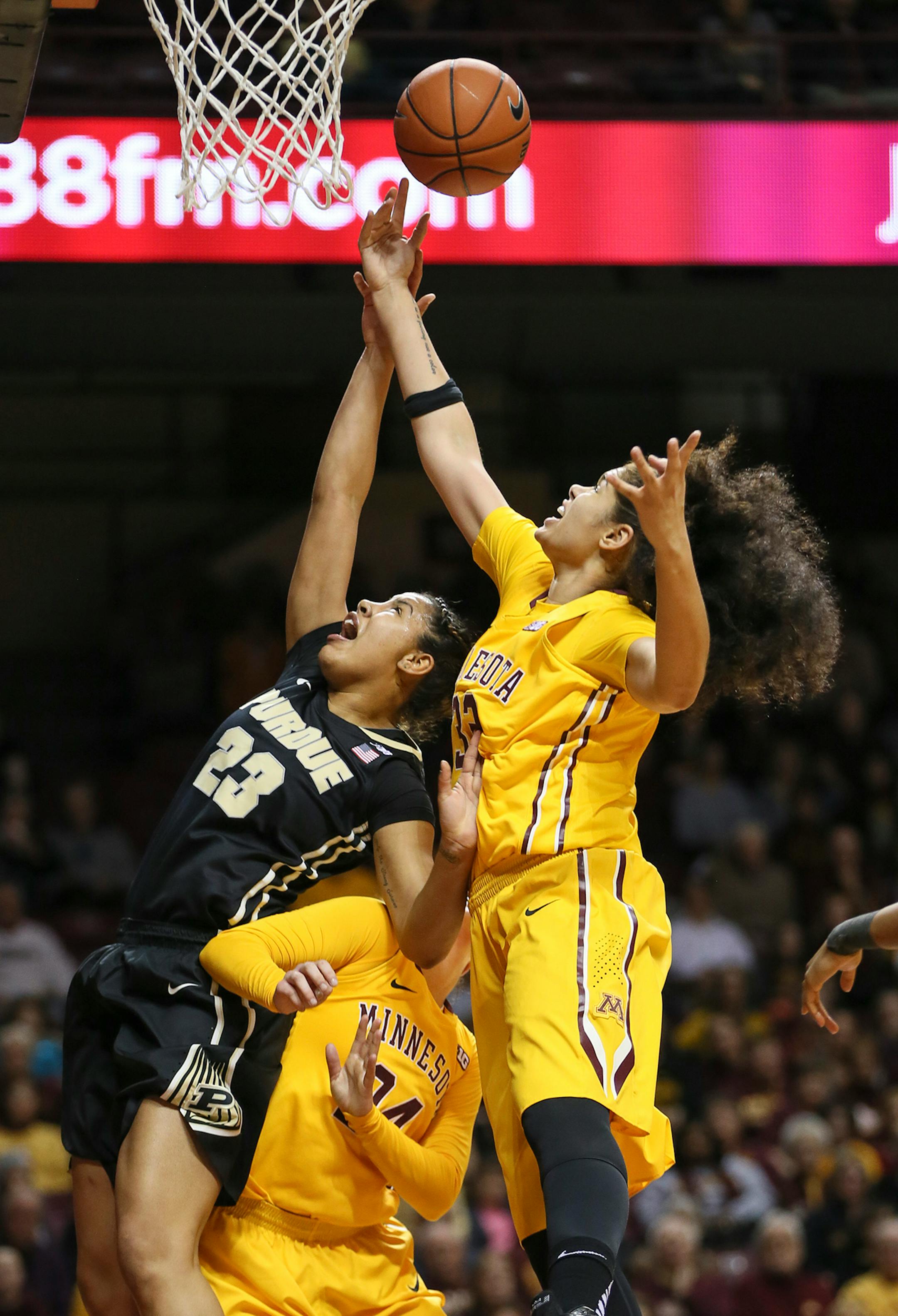 Purdue's Liza Clemons competed with Gophers Amanda Zahui B. (32) and Mikayla Bailey (24) for a rebound during the first half. ] RENEE JONES SCHNEIDER • reneejones@startribune.com Minnesota Gophers women's basketball verse. Purdue Boilermakers at Williams Arena at the University of Minnesota on Thursday, January 22, 2015 in Minneapolis, Minn.