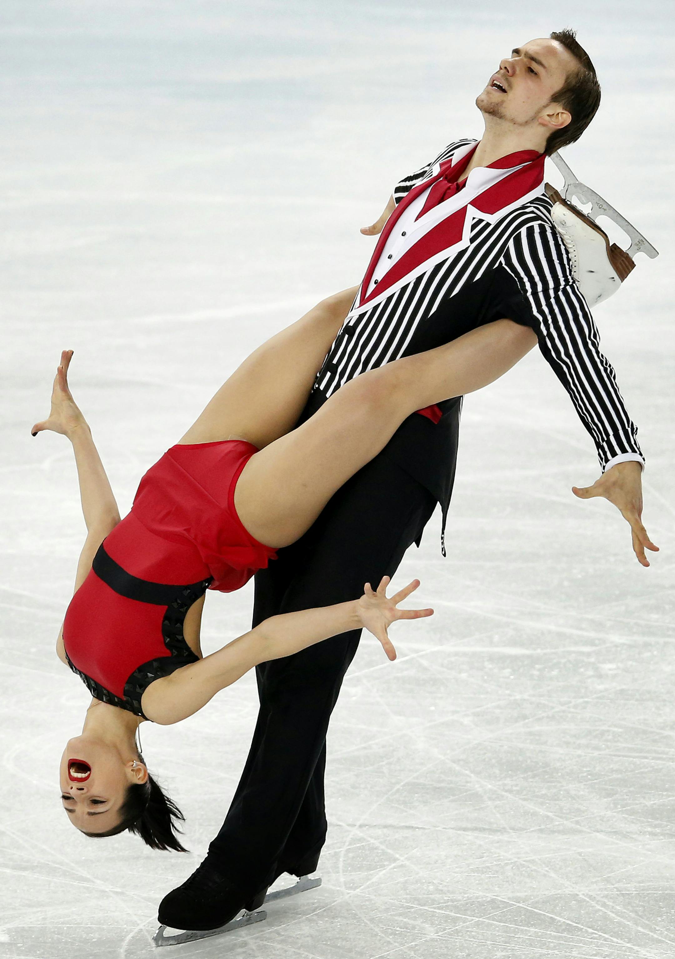 Ksenia Stolbova and Fedor Klimov of Russia performed during the pairs free program. Russia's Tatiana Volosozhar and Maxim Trankov won the gold medal with a score of 236.86, while Russia's Ksenia Stolbova and Fedor Klimov took the silver with a score of 218.68. The bronze medal went to Germany's Aliona Savchenko and Robin Szolokowy (215.78). ] CARLOS GONZALEZ cgonzalez@startribune.com - February 12, 2013, Sochi, Russia, Sochi 2014 Winter Olympics, Iceberg Skating Palace, pairs free skate