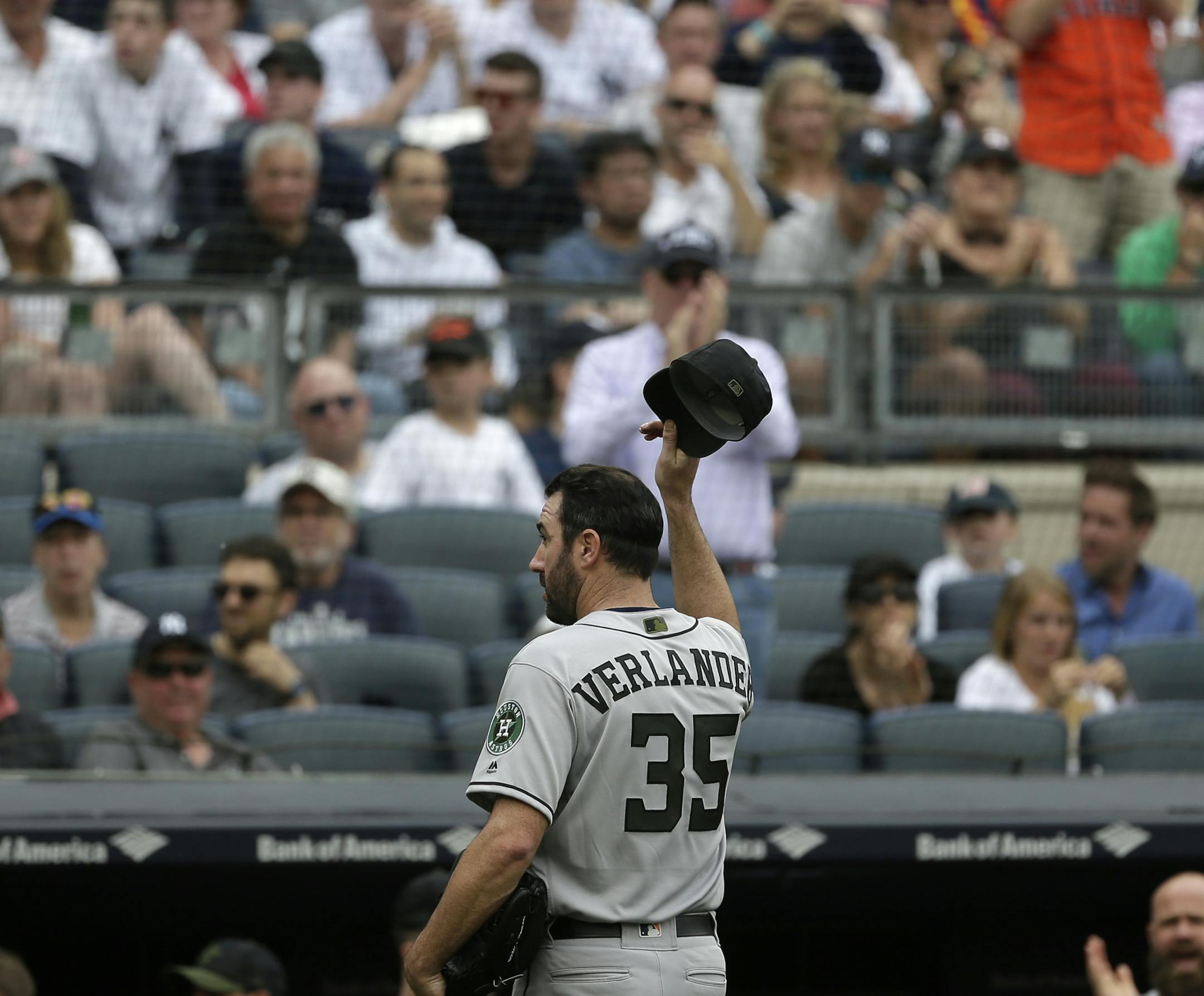 Houston Astros starting pitcher Justin Verlander tips his cap as he leaves a baseball game during the seventh inning against the New York Yankees at Yankee Stadium, Monday, May 28, 2018, in New York. (AP Photo/Seth Wenig)