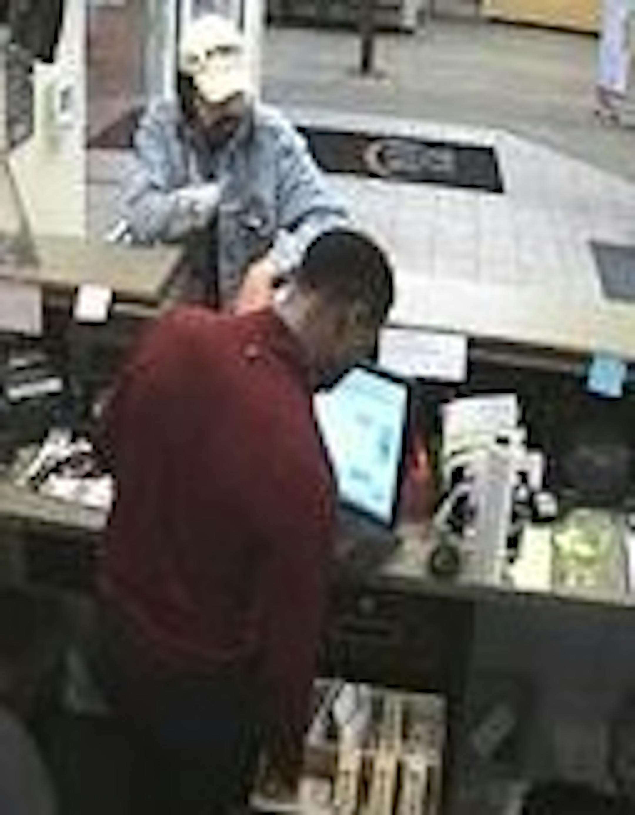 This surveillance image shows a bank robbery suspect from Dec. 3.