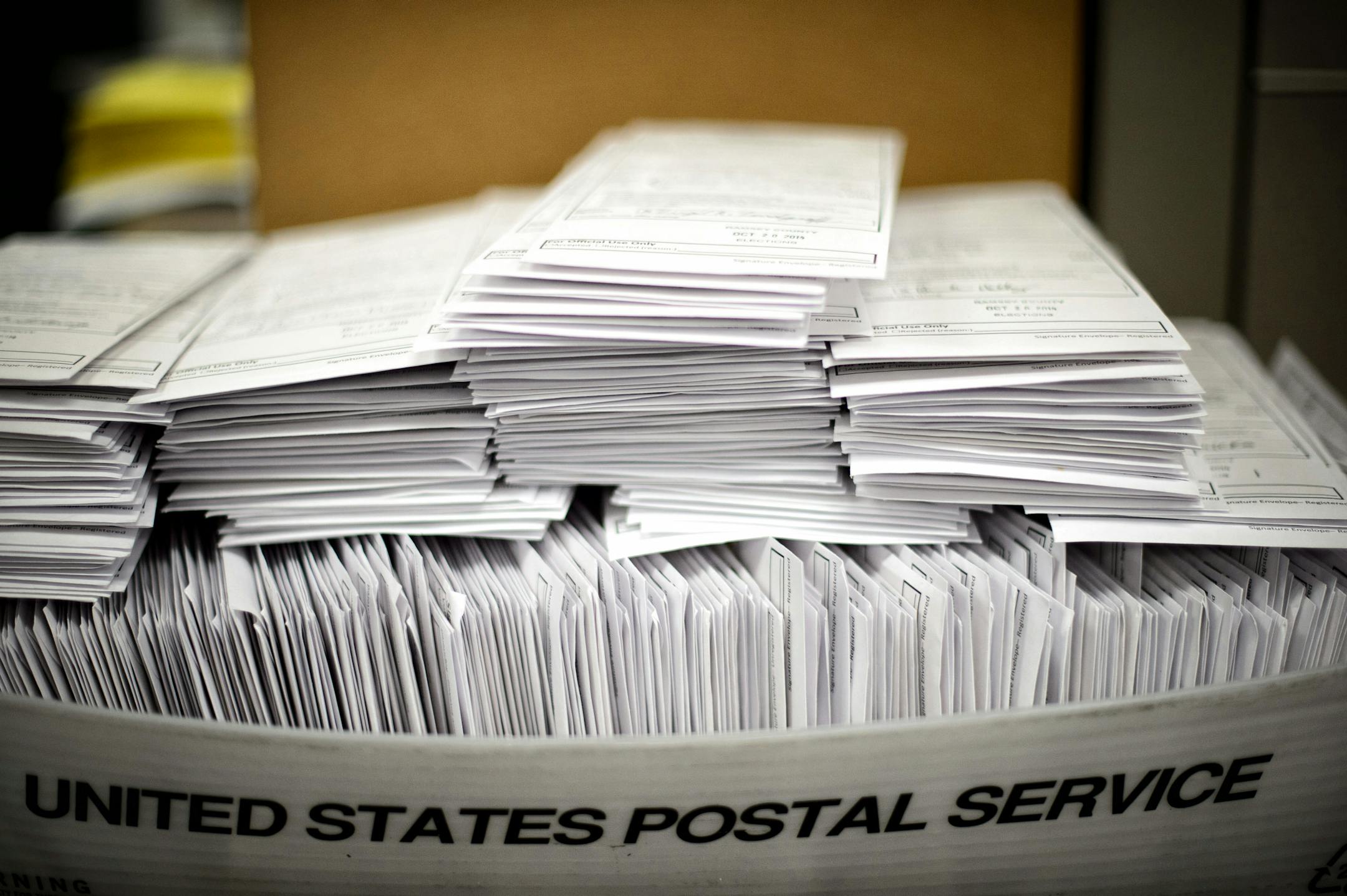 Some of the absentee ballots that arrived at the elections office in Ramsey County.