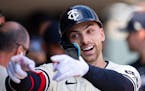 The Twins' Edouard Julien was all smiles after hitting his second home run of the game against the Dodgers in the fifth inning Wednesday at Target Fie