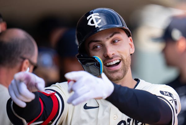The Twins' Edouard Julien was all smiles after hitting his second home run of the game against the Dodgers in the fifth inning Wednesday at Target Fie