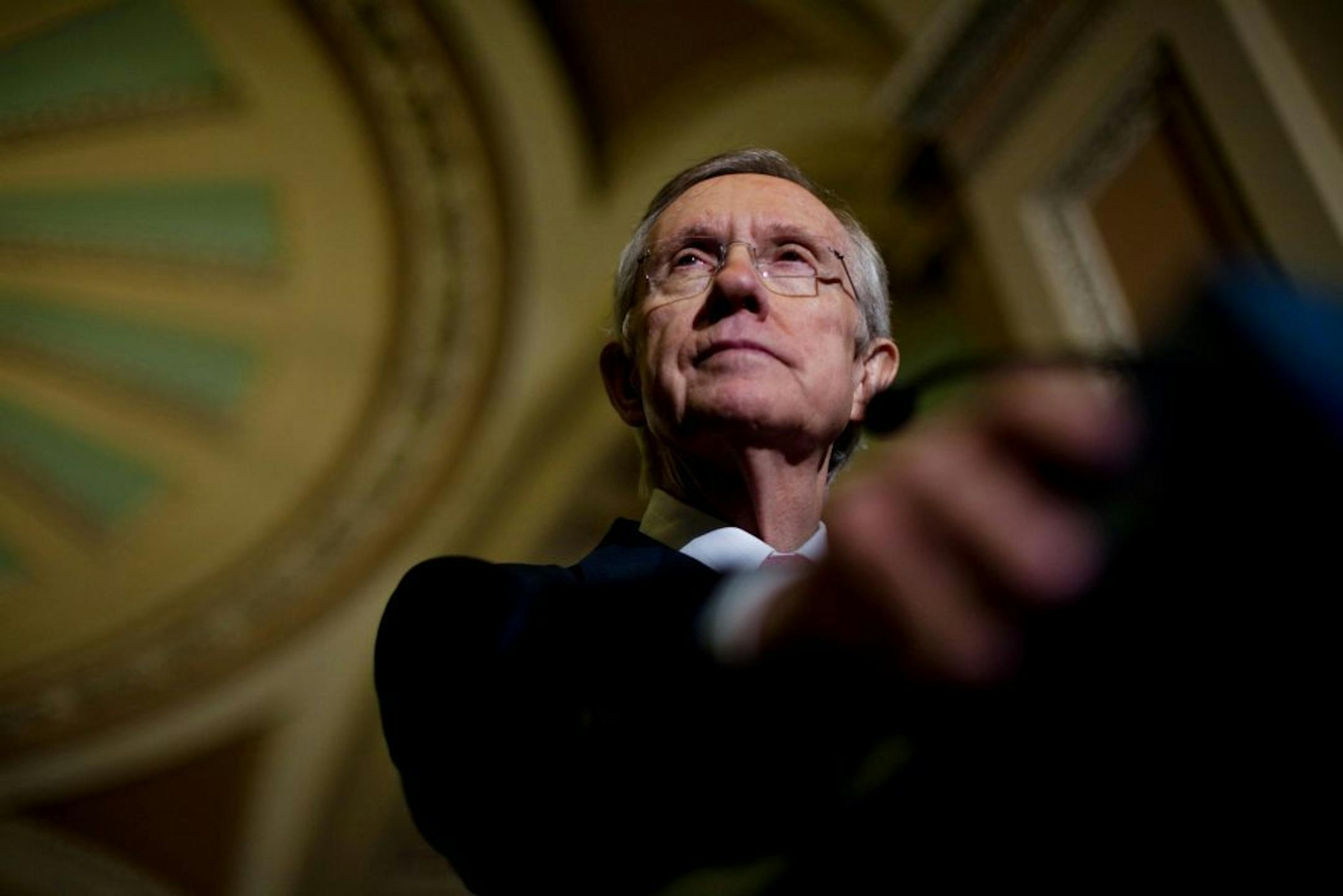 Senate Majority Leader Harry Reid (D-Nev.) speaks to reporters outside the Senate chamber on Capitol Hill in Washington, Jan. 25, 2011. Reid reiterated his defense of earmarks, stating that the ban President Barack Obama is set to propose in his State of the Union address on Tuesday night would take power away from the legislative branch in favor of the executive branch.