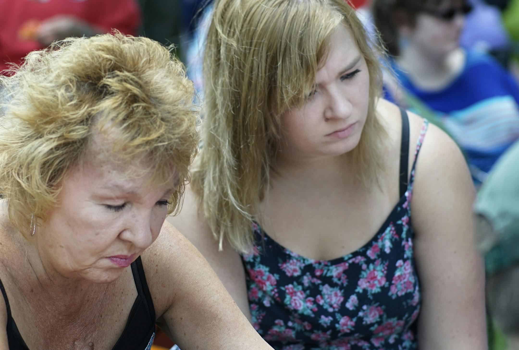 Jennifer Chawla and her daughter Olivia Richardson observed a moment of silence for those killed in the Orlando shooting. Jennifer who has two siblings who are gay, said what happened there was "very tragic, scary, and sad." They were at Golden Valley's first LGBT Pride event on Sunday in Brookview Park.