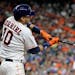 Houston Astros' Yuli Gurriel hits a single against the Minnesota Twins during the fourth inning of a baseball game Saturday, July 15, 2017, in Houston