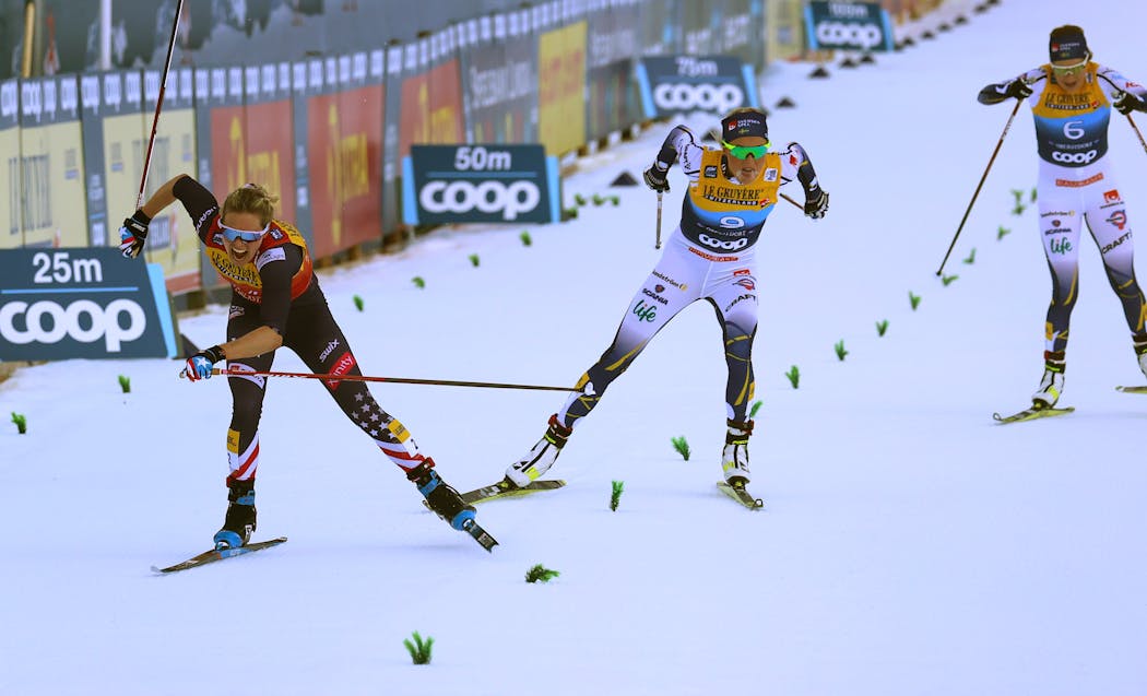 Diggins, left, on her way to winning the women’s 10 km mass start classic World Cup race in December. 
