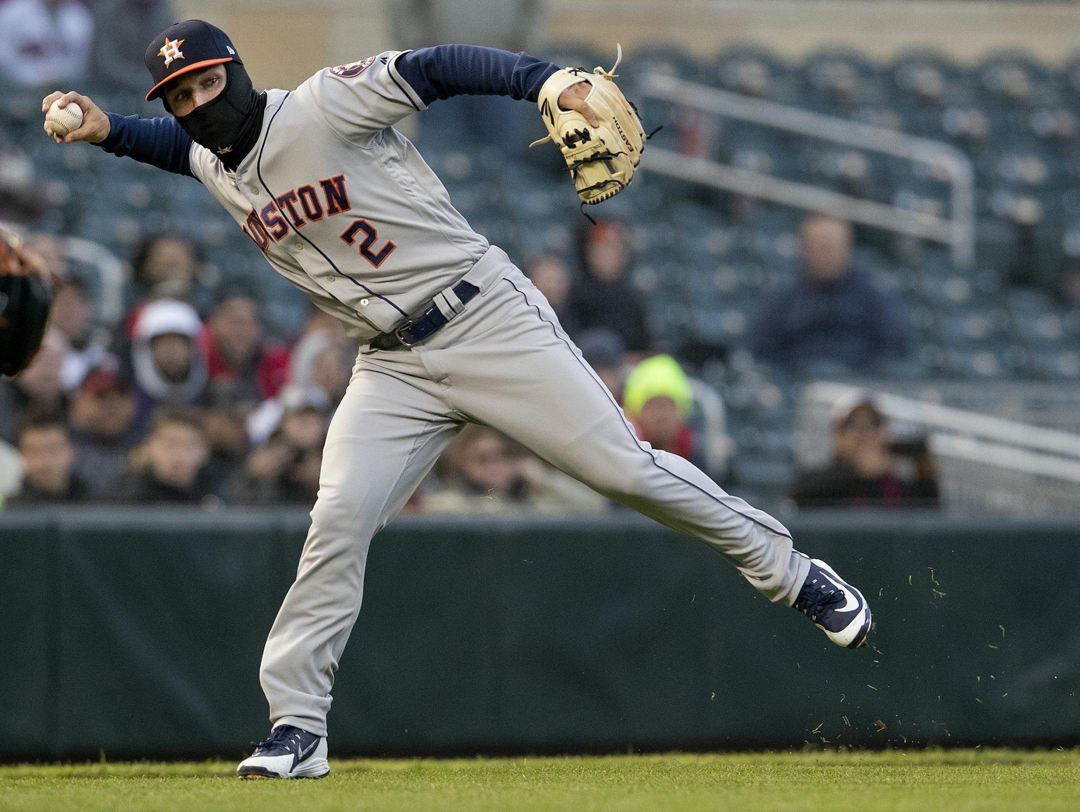 Houston Astros third baseman Alex Bregman (2) was unsuccessful in throwing out Brian Dozier in the first inning.