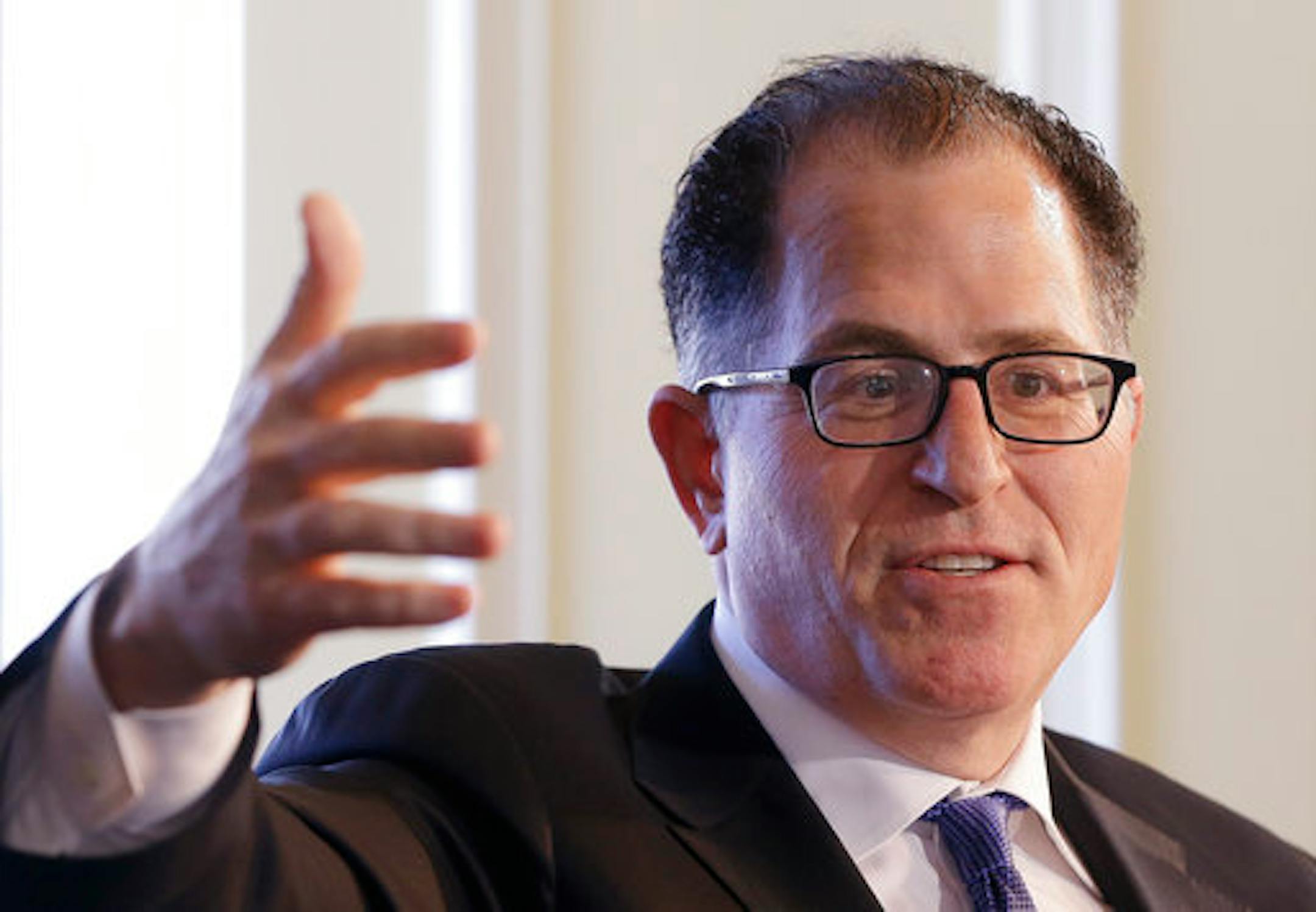 FILE- In this Nov. 28, 2017, file photo, Dell Technologies Chairman and CEO Michael Dell speaks at a Boston College Chief Executives Club luncheon in Boston. The Giving USA report, released Tuesday, June 12, 2018, said giving from individuals, estates, foundations and corporations reached an estimated $410 billion in 2017. The biggest increase was in giving to foundations, up 15.5 percent. This surge was driven by large gifts by major philanthropists to their own foundations, including $1 billio