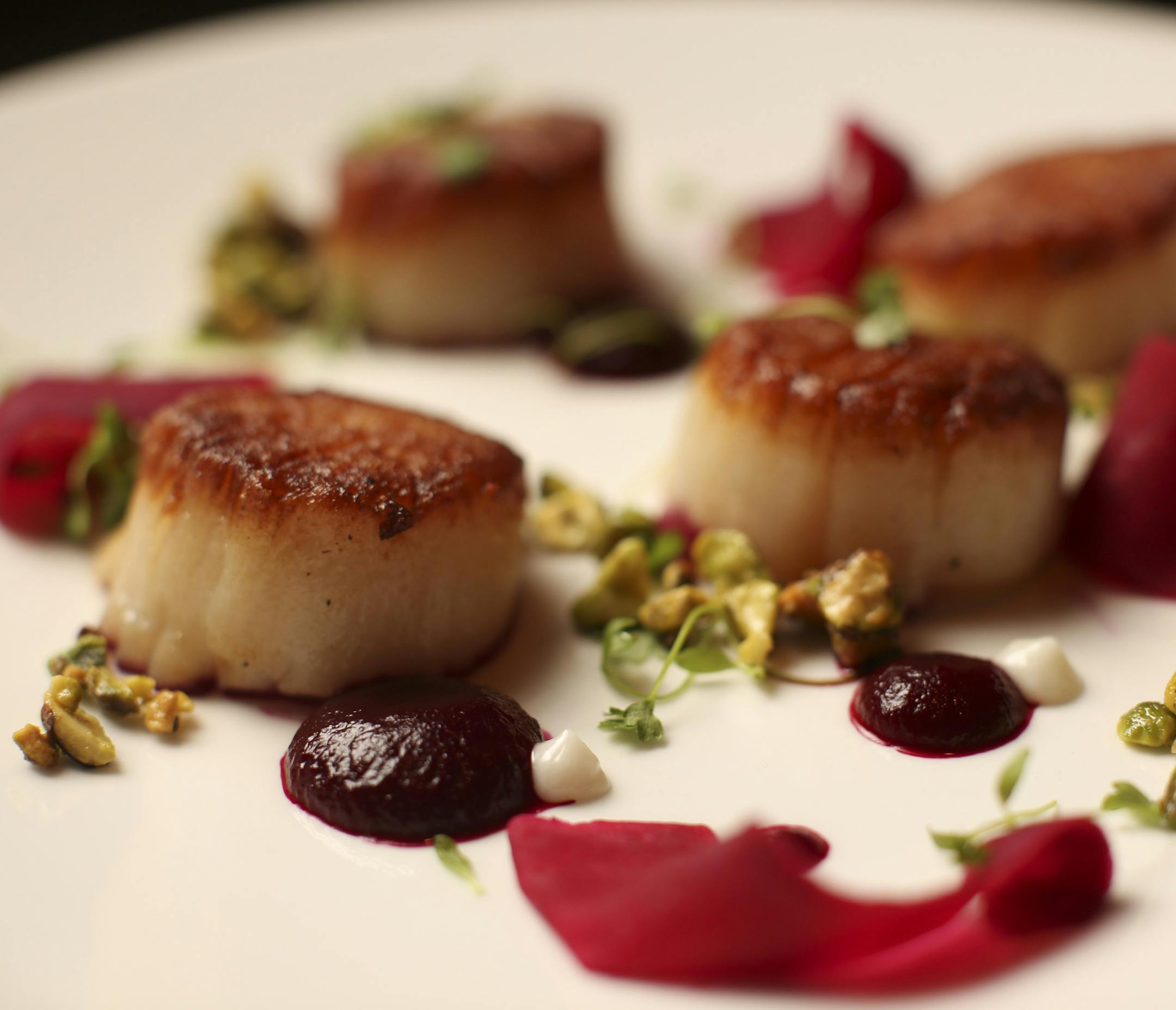 Union Fish Market in downtown Minneapolis is a new seafood restaurant on Hennepin Ave. The chef's sea scallops, as prepared Tuesday evening, November 19, 2013 by chef Lucas Almendinger. ] JEFF WHEELER ‚Ä¢ jeff.wheeler@startribune.com