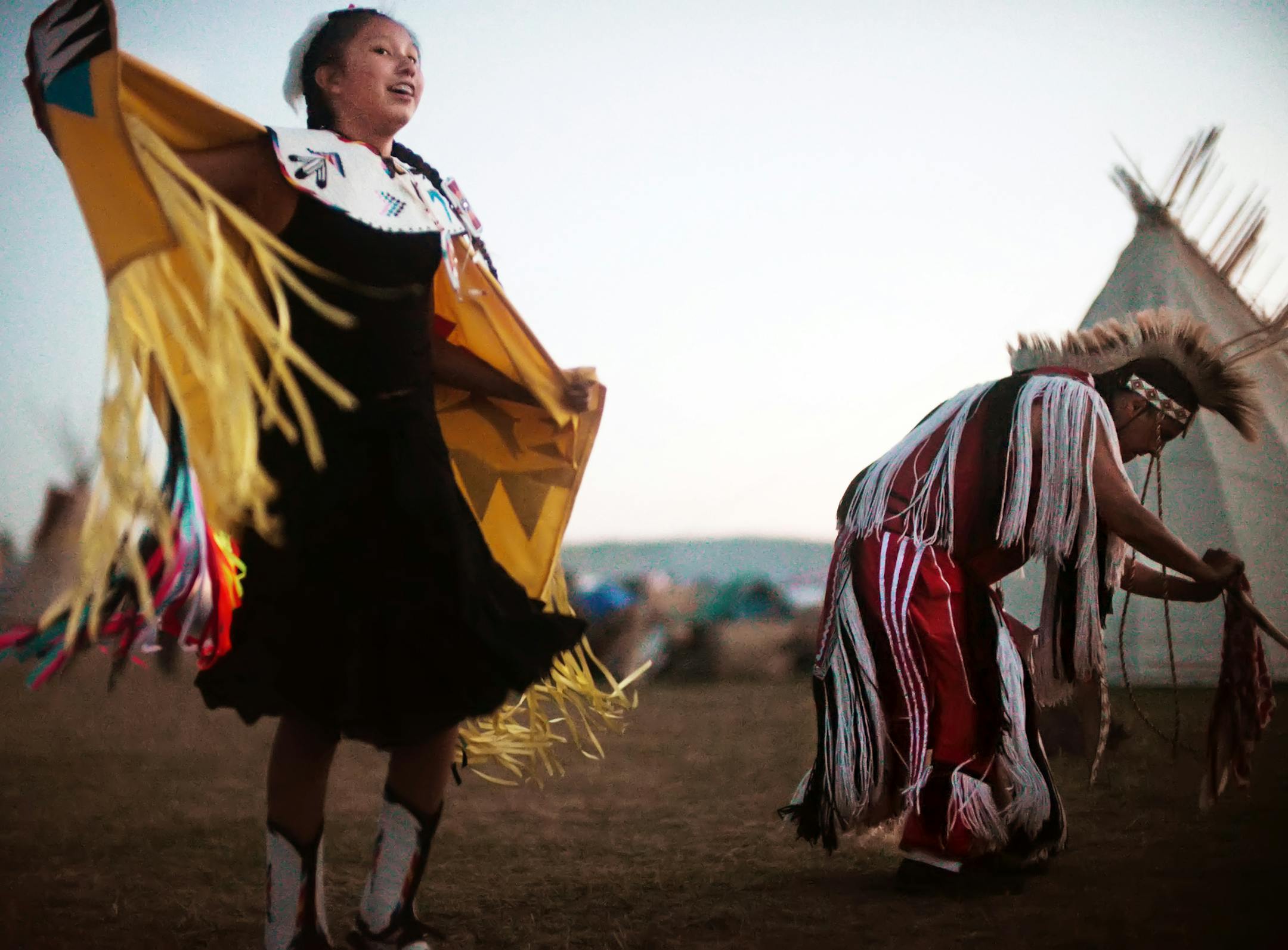 Rain Swan,13, is Crow/Lakota who is dancing in her fancy shawl outfit to the drumming of Iron Bull, a group from the Standing Rock Reservation. I am "trying to save the kids who are coming into this world so they can have clean water," she said. ORG XMIT: MIN1609221731131883