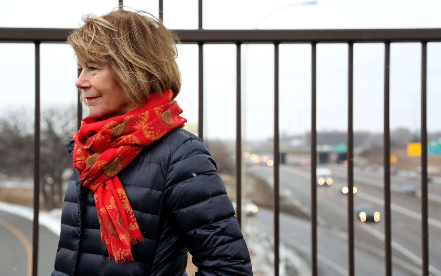 Lt. Governor Tina Smith listened to Charles Zelle, Minnesota transportation commissioner, addressed the media about a proposed transportation plan. ] (KYNDELL HARKNESS/STAR TRIBUNE) kyndell.harkness@startribune.com Press conference unveiling the Gov. Dayton's transportation proposal On a bridge overlooking 494 and 35W in Bloomington, Min., Tuesday, February 24, 2015.