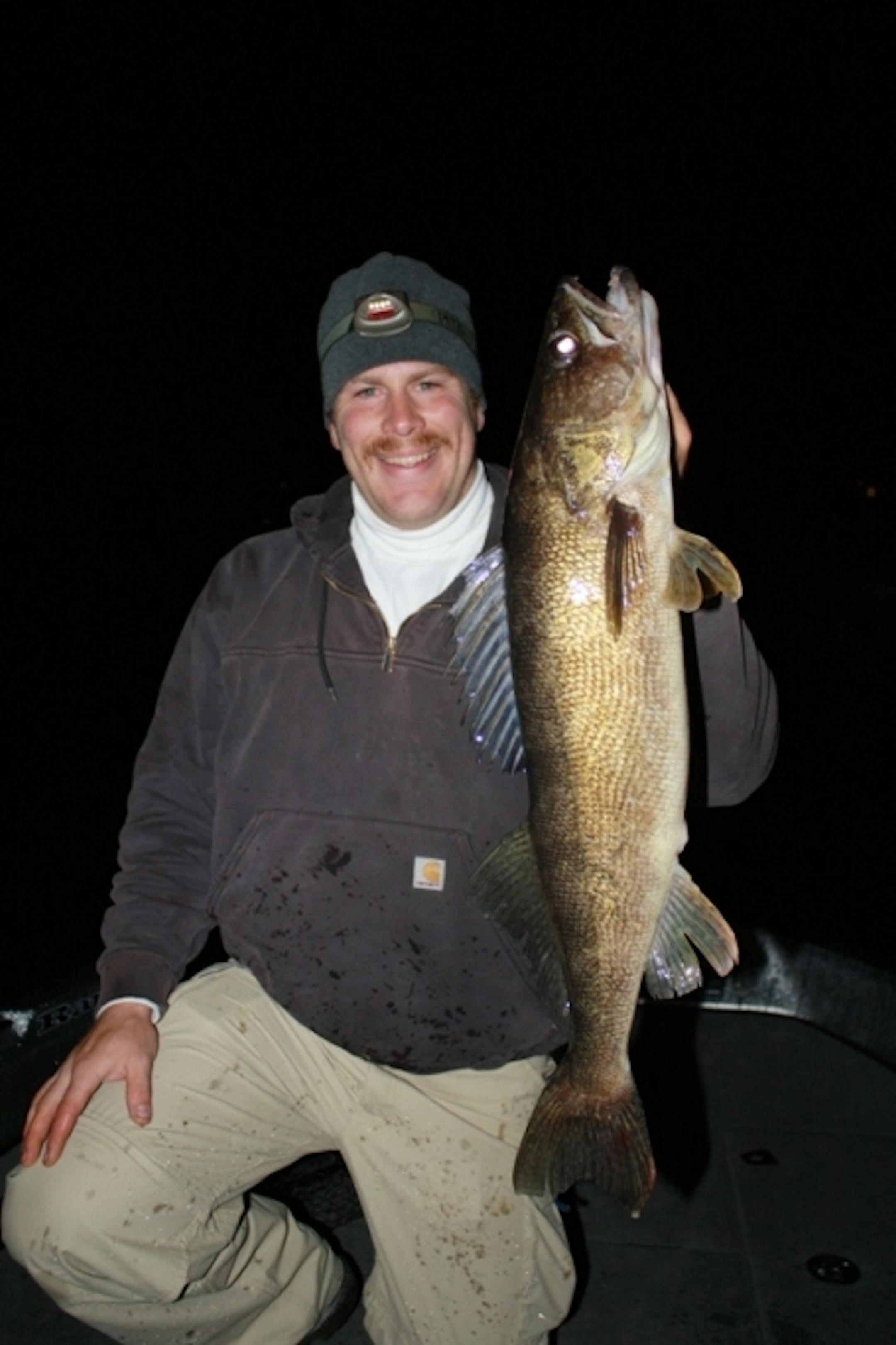 Dusty Gesinger with a dandy "Midnight Walleye" while fishing the opener with the author Travis Frank