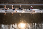 The University of Minnesota women’s rowing team practiced in 50-degree temperatures on the Mississippi River in Minneapolis.