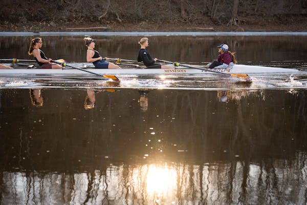 The University of Minnesota women’s rowing team practiced in 50-degree temperatures on the Mississippi River in Minneapolis.