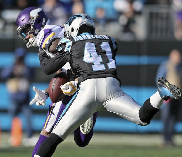 Stefon Diggs drops the ball after being defended by former Viking Captain Munnerlyn. Incomplete Pass. ] Minnesota Vikings vs Carolina Panthers - Bank 
