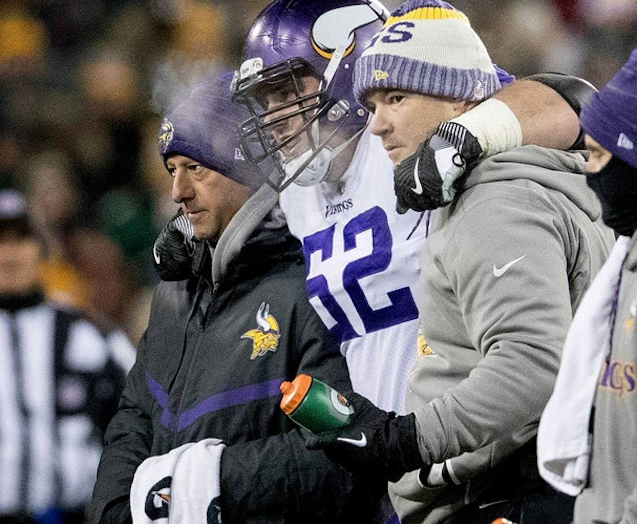 Nick Easton is helped from the field Saturday night.