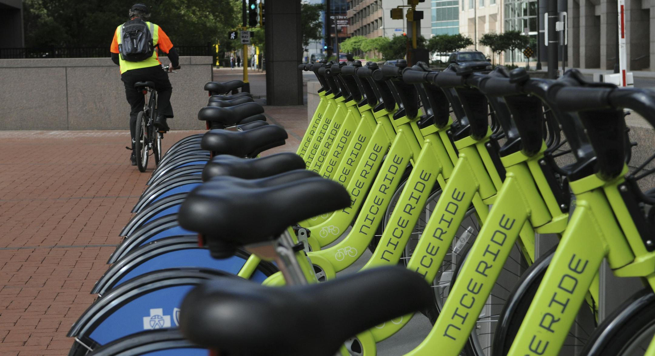 Richard Sennott/Star Tribune. Richard.Sennott@startribune.com Minneapolis, Mn. Thursday 06/09/11 ] The Bike Walk to Work Day celebration was held this morning at Hennepin County Government Center Plaza . These Nice Ride bikes are all lined up waiting for riders on the plaza.